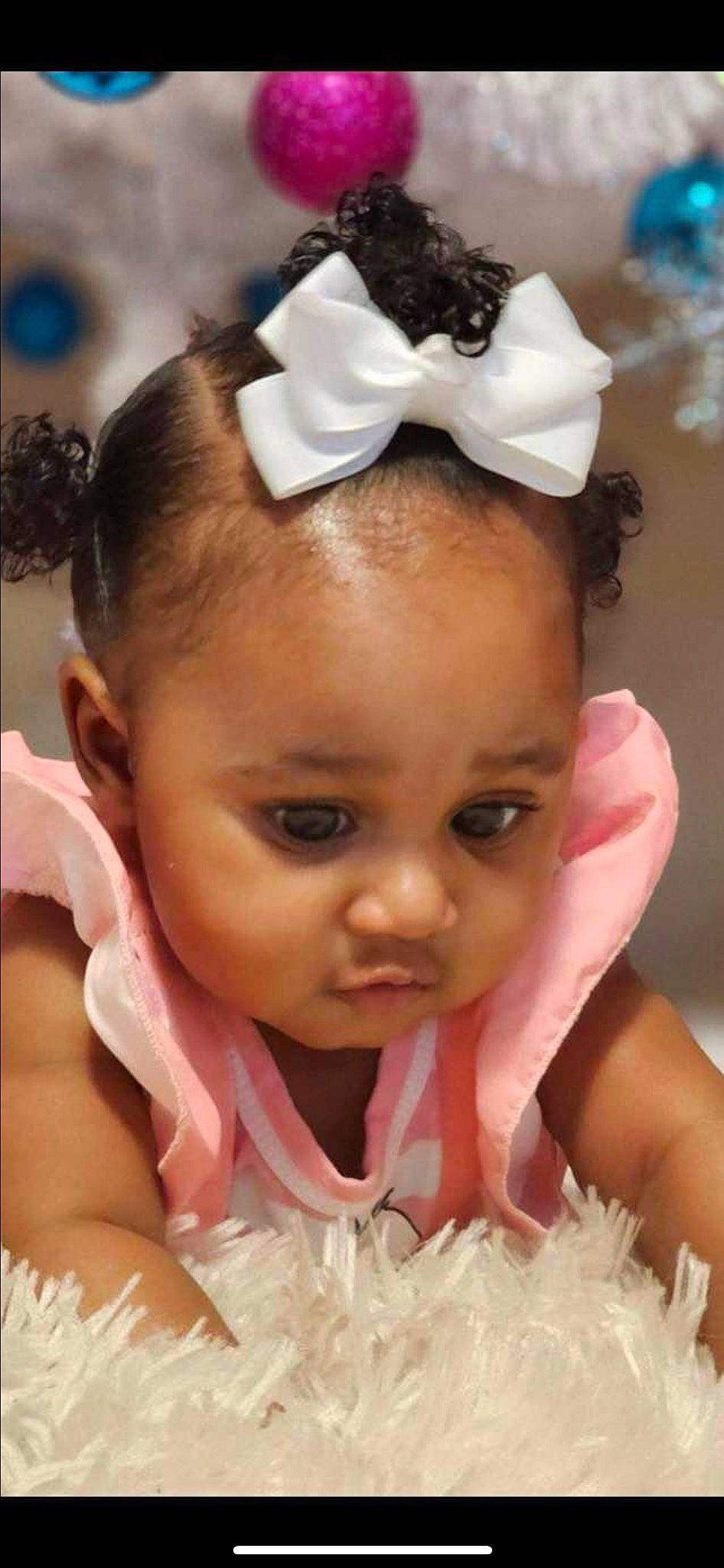 Destiny is registered to the contest to win money with this photo: baby, beauty, cheek, child, chin, dress, ear, event, eyebrow, eyelash, fashion_accessory, happy, headpiece, jewellery, lip, nose, organ, person, pink, toddler