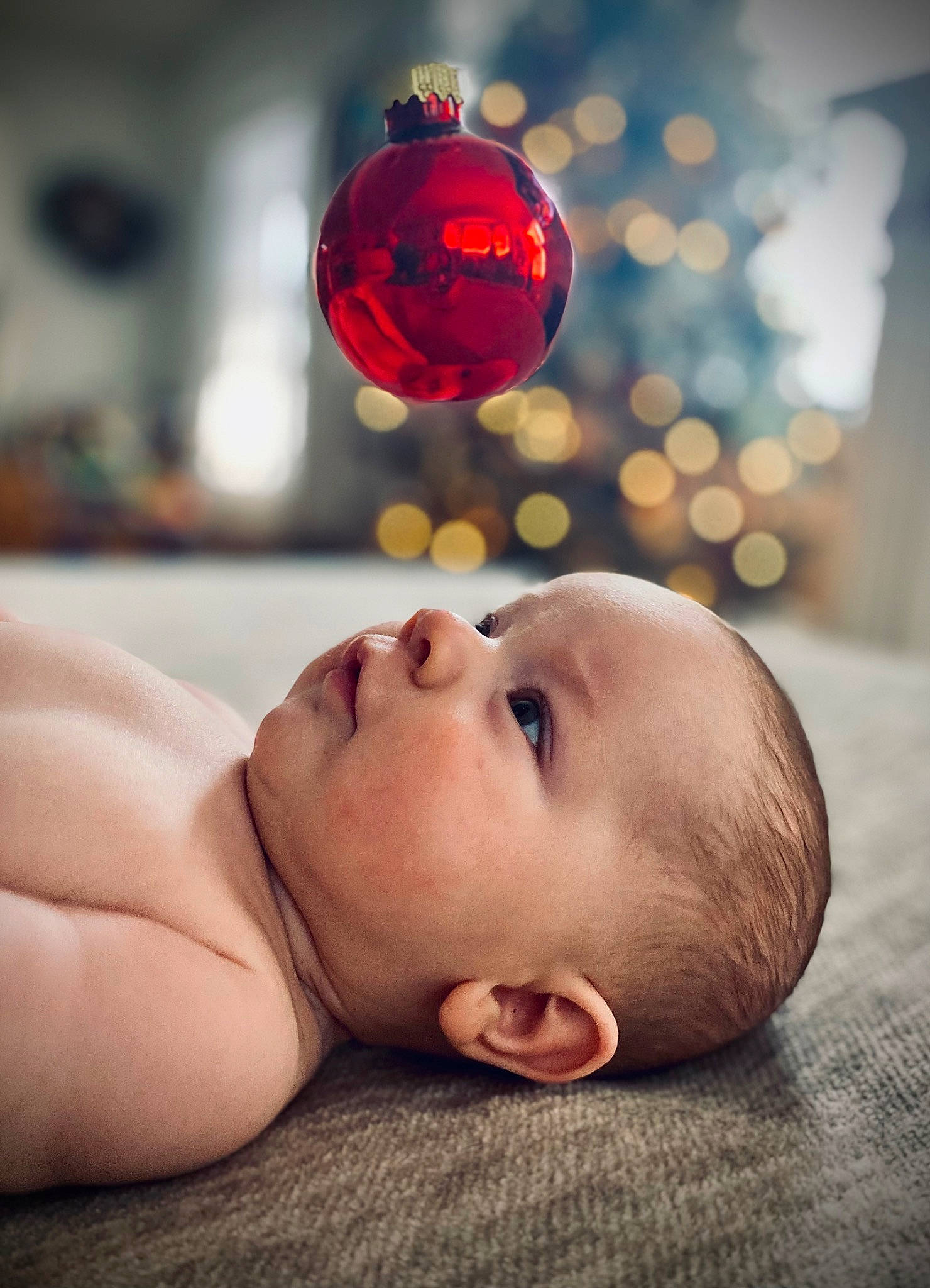 Brielle is registered to the contest to win money with this photo: baby, beauty, bedtime, child, comfort, flash_photography, flesh, flooring, fun, happy, holiday, lighting, lip, ornament, person, portrait_photography, sitting, skin, toddler, tummy_time