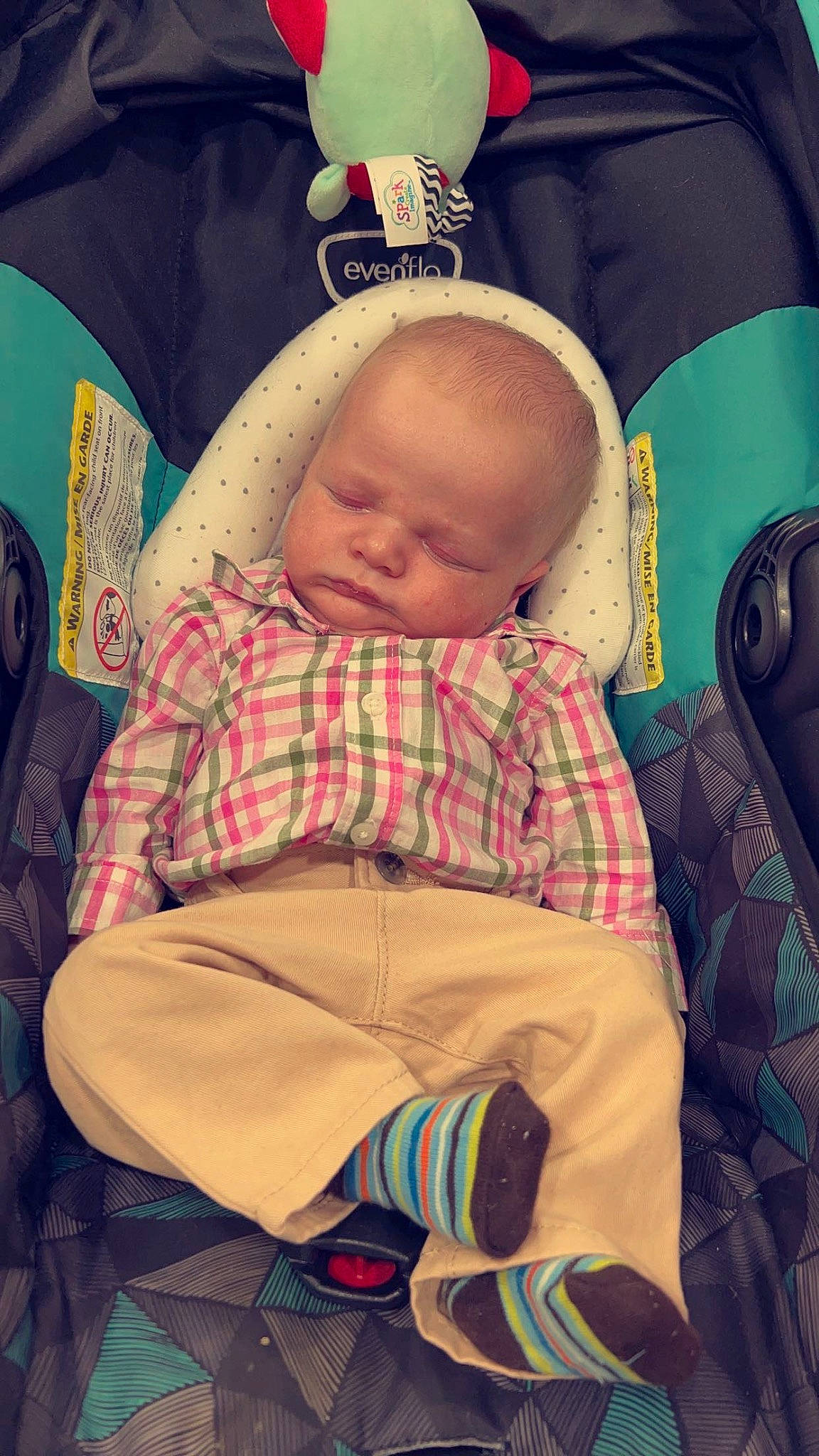 Jaxon is registered to the contest to win money with this photo: baby, baby_products, baby_sleeping, baby_toddler_clothing, bedding, bedtime, car_seat, child, comfort, happy, lap, linens, nap, pattern, person, room, sitting, sleep, textile, throw_pillow