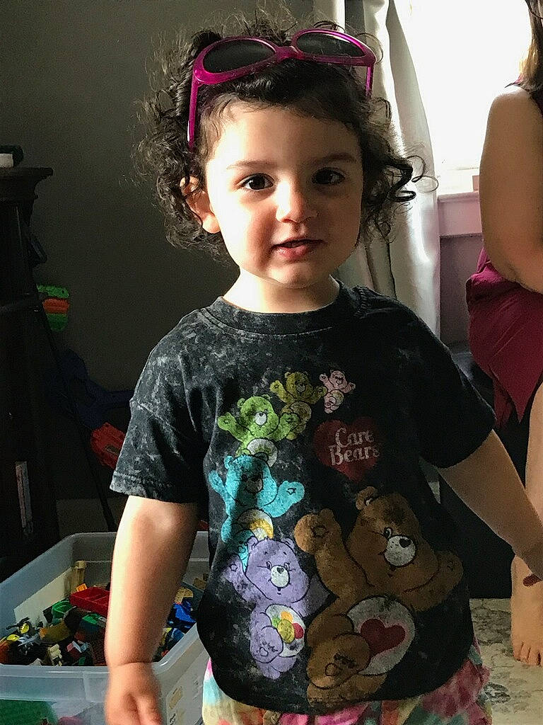 Courtney joined the competition — help win amazing prizes! baby_toddler_clothing, child, cool, day_dress, dress, eyewear, goggles, hairstyle, happy, head, iris, neck, pattern, person, shoulder, skin, sleeve, standing, sunglasses, t_shirt