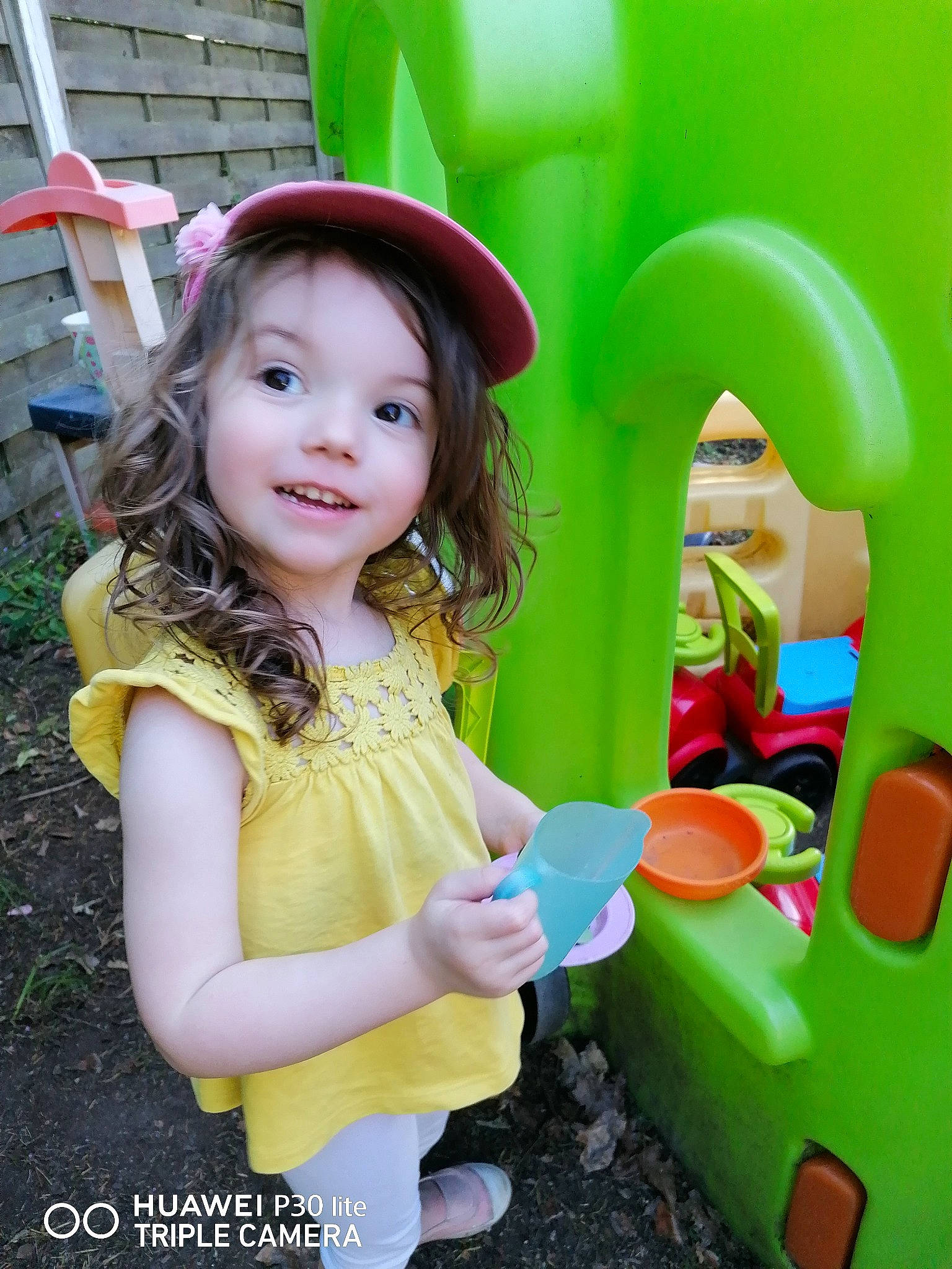 Lilou participe au concours pour gagner de l'argent avec cette photo : baby_playing_with_toys, beauty, child, event, fun, grass, green, happy, hat, human_settlement, leisure, magenta, people_in_nature, person, pink, playground, product, public_space, recreation, smile