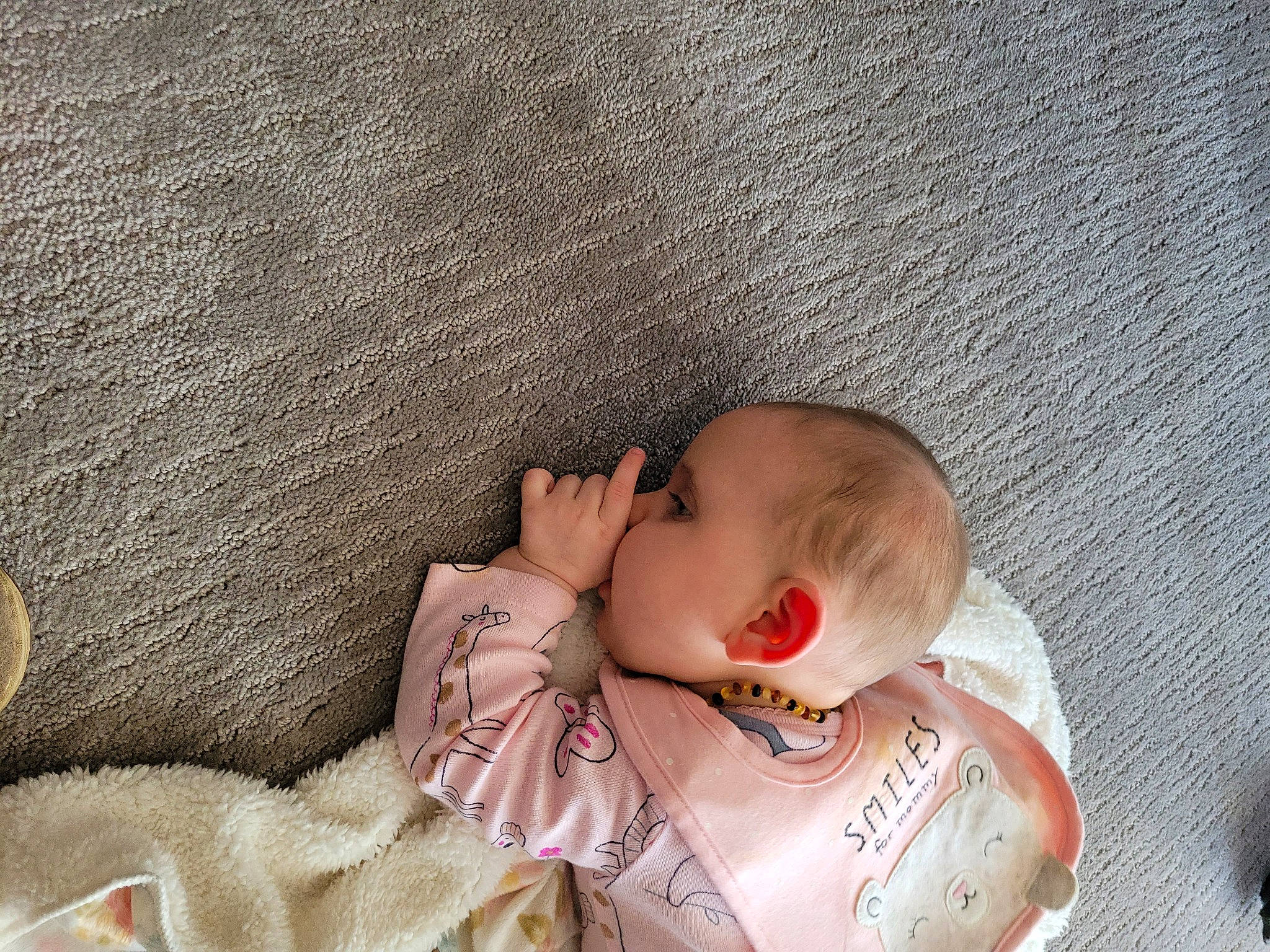 Everlee is registered to the contest to win money with this photo: abdomen, arm, baby, baby_products, baby_sleeping, baby_toddler_clothing, cheek, child, comfort, doll, eye, eyelash, head, human_body, linens, person, sitting, skin, toddler, toy
