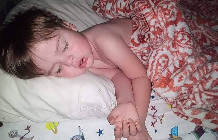 Elijah is registered to the contest to win money with this photo: arm, cheek, comfort, eye, eyebrow, finger, hairstyle, happy, human, iris, lip, mouth, muscle, nose, person, pink, product, skin, smile, textile