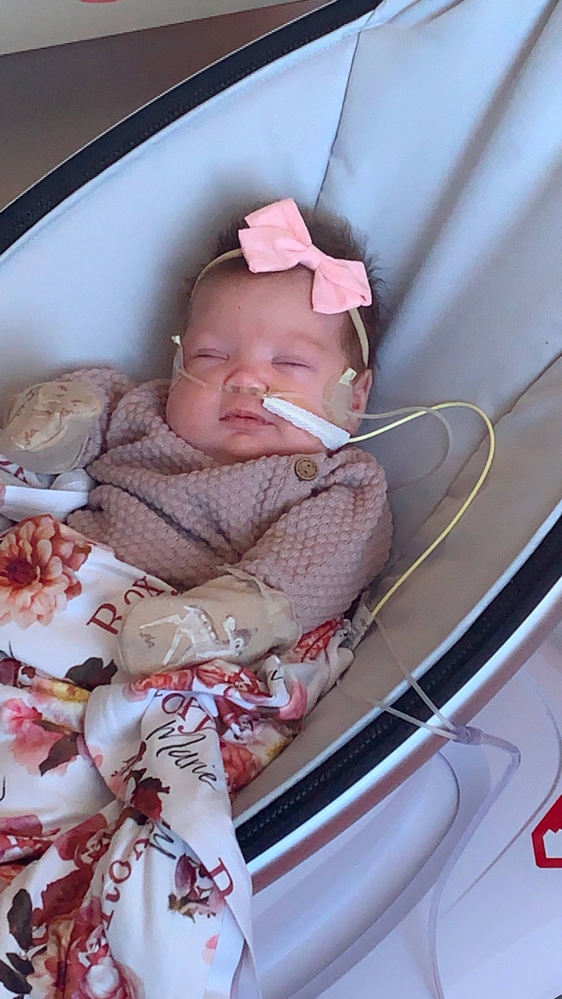 Roxy joined the competition — help win amazing prizes! automotive_exterior, automotive_lighting, baby, baby_carriage, baby_products, baby_safety, baby_sleeping, baby_toddler_clothing, bedding, child, comfort, hood, infant_bed, linens, motor_vehicle, pattern, person, skin, toddler, vehicle_door