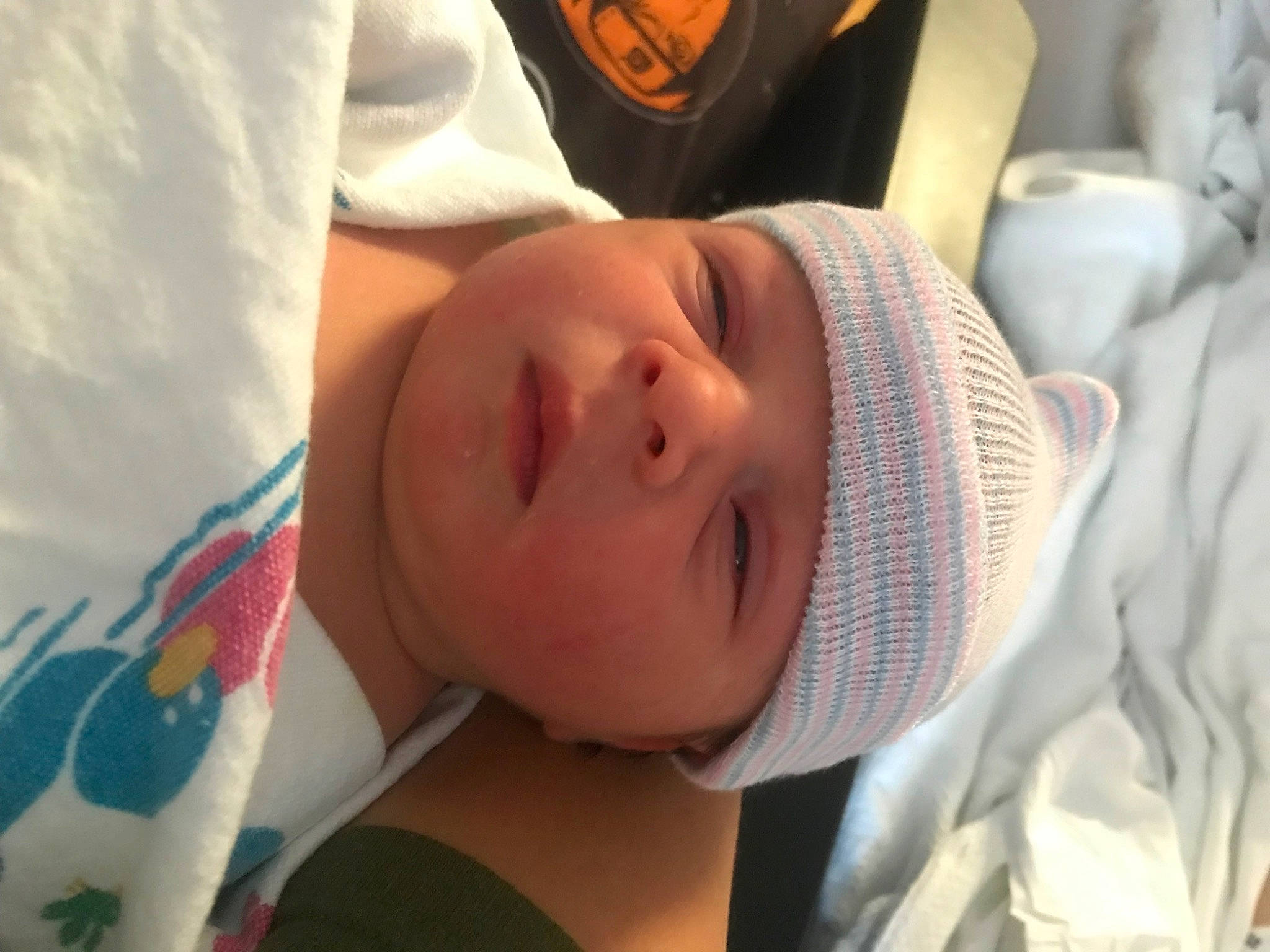 Jude joined the competition — help win amazing prizes! baby, baby_products, baby_toddler_clothing, cheek, child, comfort, eyelash, fun, happy, hat, headgear, headwear, linens, lip, mouth, nap, nose, person, room, skin