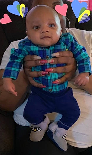 Major is registered to the contest to win money with this photo: baby, baby_products, cheek, child, cool, design, ear, head, pattern, person, plaid, play, product, sitting, smile, tartan, textile, toddler, toy