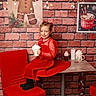 Théa participe au concours pour gagner de l'argent avec cette photo : brick_wall, candle, chair, child, christmas, decorations, festive, gingerbread_man, girl, happy, holiday, hot_chocolate, indoor, lights, mug, portrait, red_dress, smile, table, whipped_cream