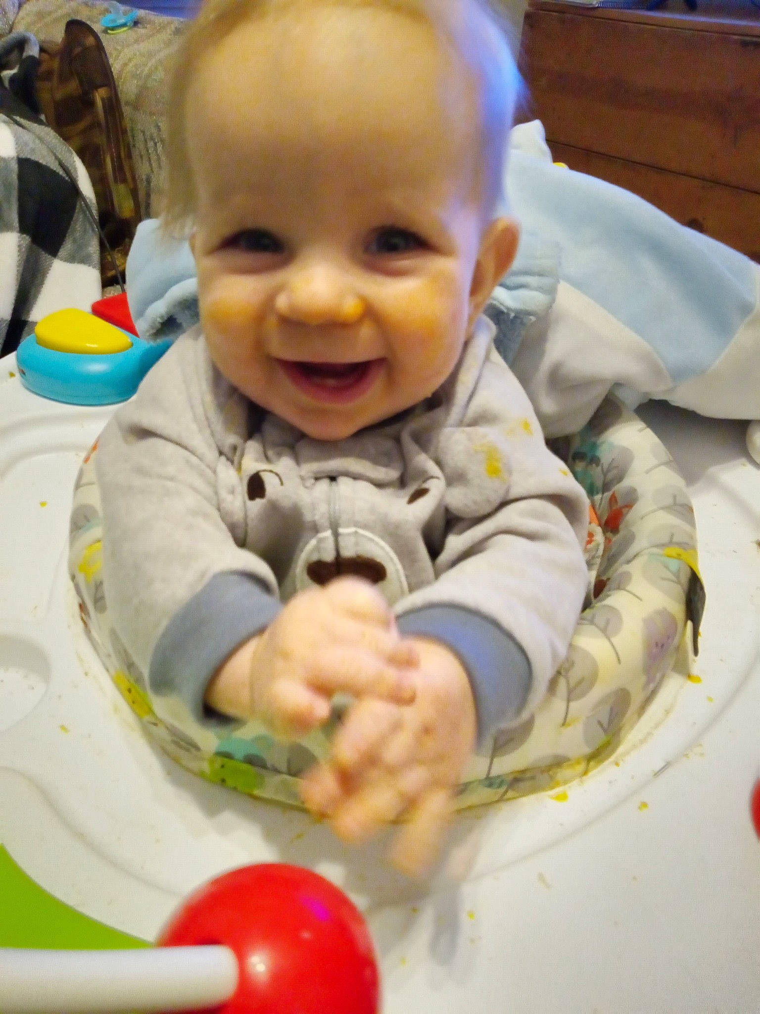 Chase is registered to the contest to win money with this photo: baby, baby_playing_with_toys, baby_toddler_clothing, cheek, child, eye, facial_expression, finger, fun, hand, happy, head, iris, nose, person, skin, sleeve, smile, snapshot, thumb