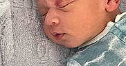 Tayo joined the competition — help win amazing prizes! baby, blanket, child, closeup, clothing, cute, ear, face, head, indoors, infant, newborn, peaceful, portrait, resting, skin, sleeping, soft, texture, young