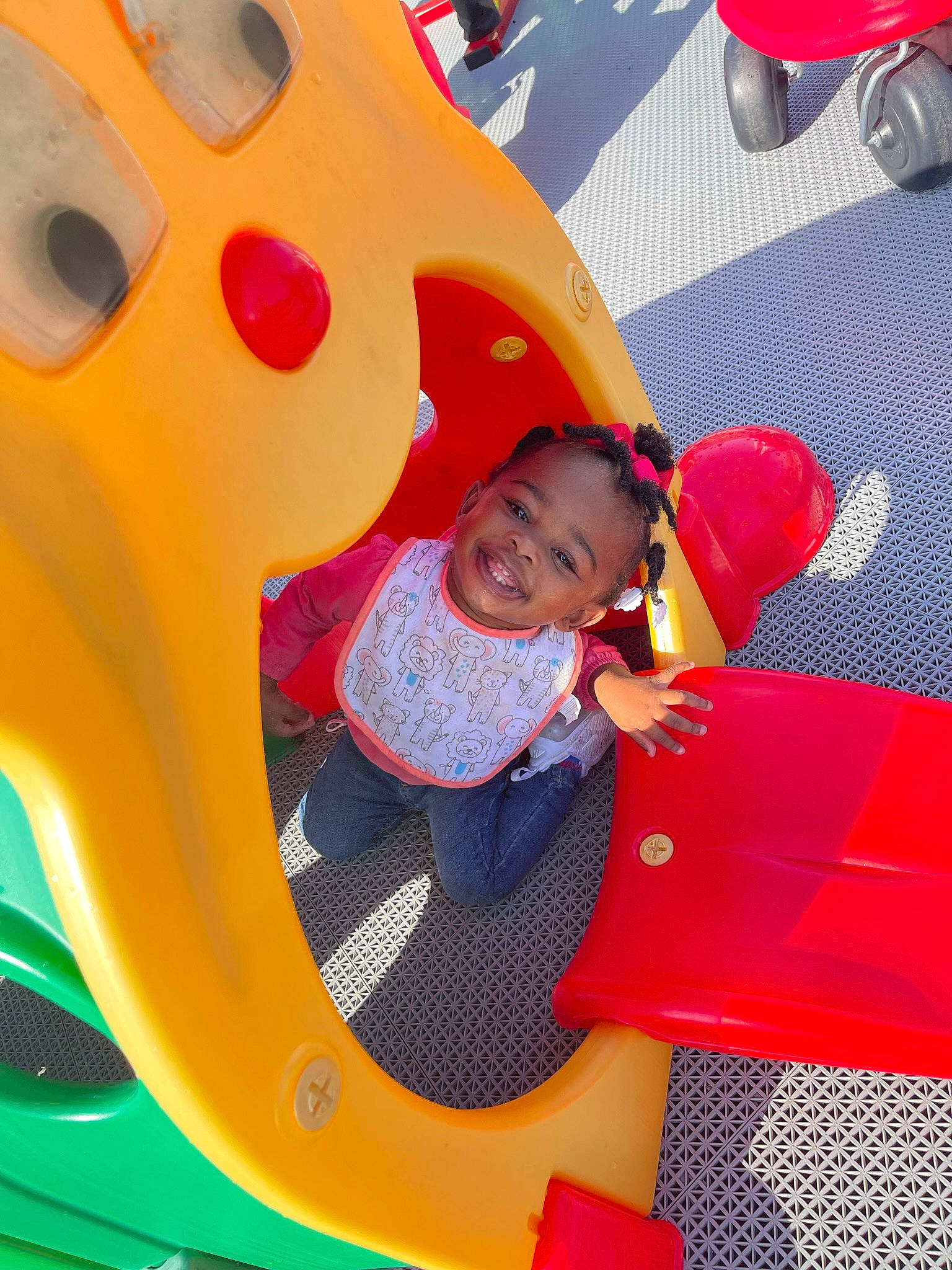 Amia joined the competition — help win amazing prizes! automotive_design, automotive_exterior, automotive_wheel_system, baby, baby_toddler_clothing, bumper, child, fun, happy, joy, leisure, magenta, motor_vehicle, person, pink, playground, recreation, red, smile, snapshot