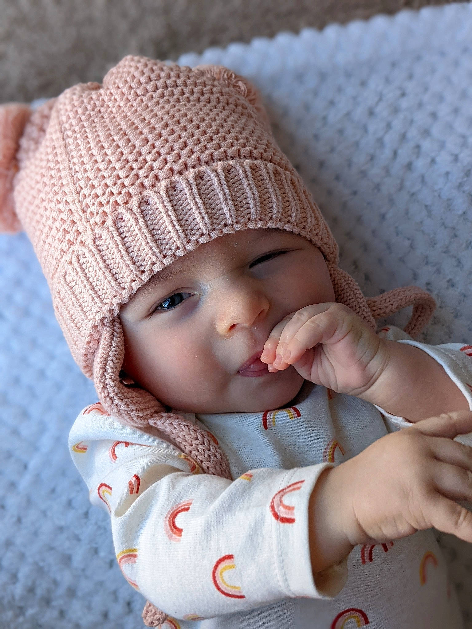 Raelynn joined the competition — help win amazing prizes! baby, baby_toddler_clothing, cap, cheek, child, close_up, comfort, fashion_accessory, gesture, happy, headgear, headwear, knit_cap, lip, pattern, person, skin, sleeve, textile, toddler