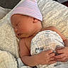 baby, blanket, child, comfort, cozy, cute, hands, hat, headwear, indoors, infant, newborn, peaceful, person, pillow, resting, skin, sleeping, soft, wrapped