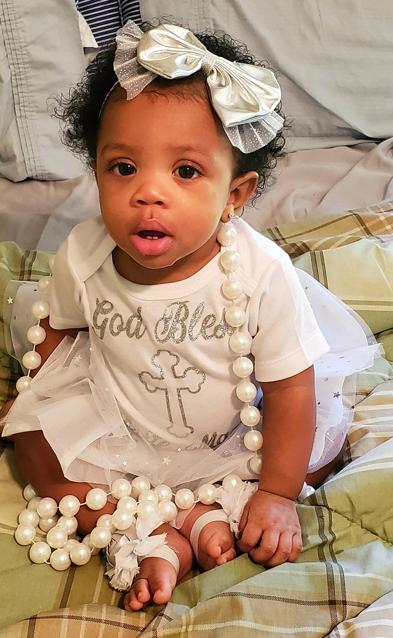 Celeste joined the competition — help win amazing prizes! baby, cheek, child, face, hair_accessory, head, headband, headpiece, person, sitting, skin, smile, toddler