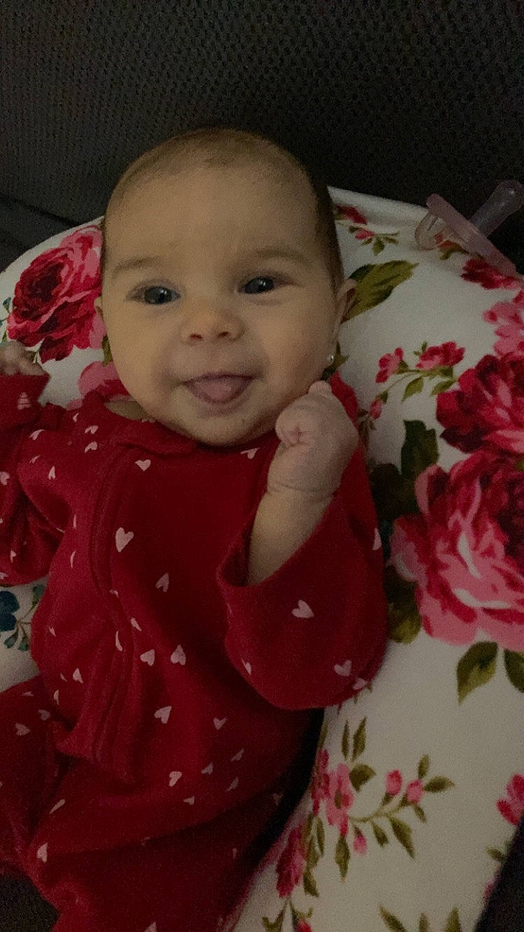 Love joined the competition — help win amazing prizes! baby, baby_products, baby_toddler_clothing, cheek, child, eye, happy, iris, lip, mouth, nose, pattern, person, petal, pink, rose, skin, sleeve, smile, textile