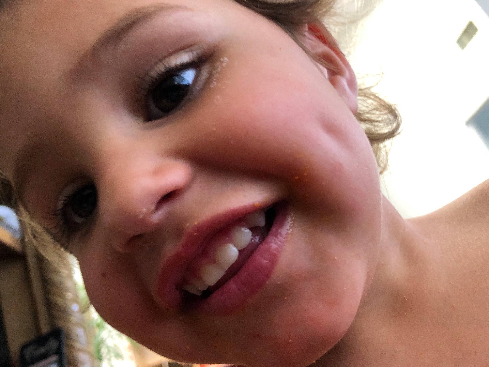 Keylani is registered to the contest to win money with this photo: cheek, child, chin, close_up, eye, eyebrow, face, facial_expression, forehead, head, jaw, joy, lip, mouth, neck, nose, organ, person, skin, smile