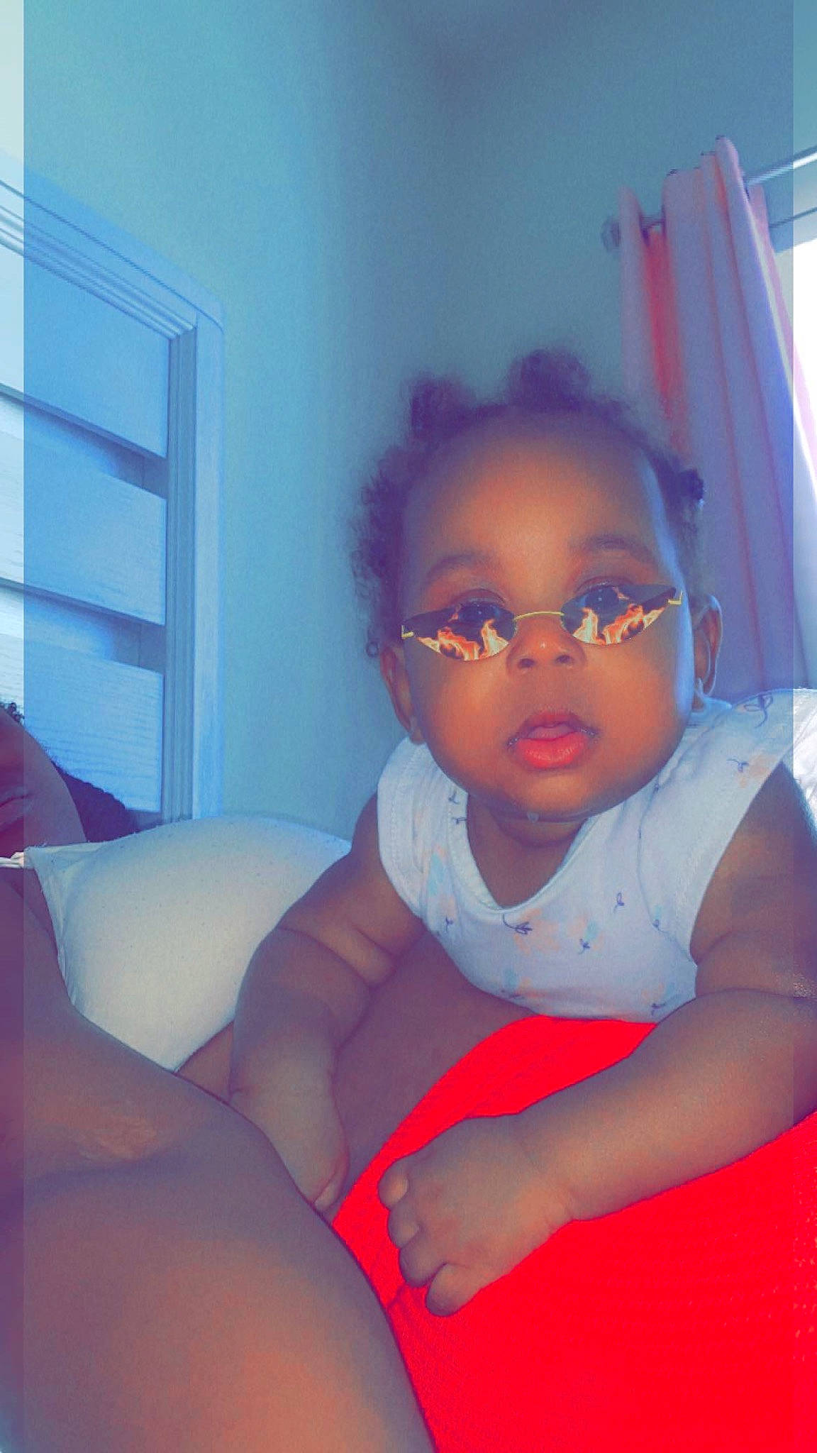 Avah Amore is registered to the contest to win money with this photo: comfort, elbow, electric_blue, eye, eyewear, flash_photography, floor, flooring, glasses, hairstyle, happy, human_body, human_leg, leisure, lip, person, shoulder, thigh, toddler, trunk