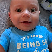 Lazarent joined the competition — help win amazing prizes! baby, blanket, blue_onesie, child, clothing, cute, expression, eyes, face, happy, head, indoors, infant, lying_down, person, portrait, smiling, soft_surface, toddler, young