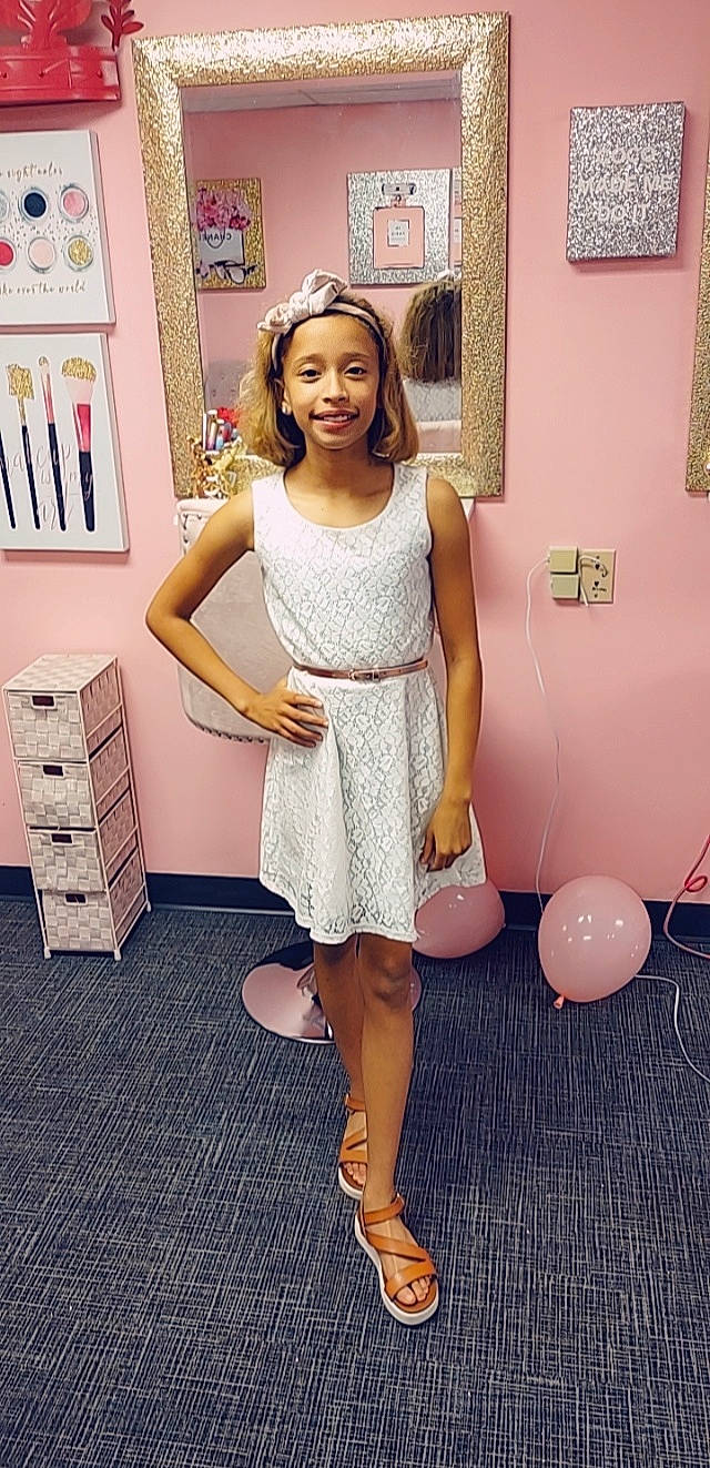 Sa'Niya is registered to the contest to win money with this photo: arm, day_dress, fashion_design, floor, flooring, fun, happy, headwear, joint, joy, knee, one_piece_garment, person, picture_frame, pink, shoulder, skin, sleeve, smile, standing