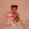 toddler, child, pink, teddy_bear, rose_petals, pigtails, bows, fluffy_rug, kiss_marks, soft_background, plush_toy, portrait, cute, baby, indoor, fabric, flower, sitting, skin, adorable