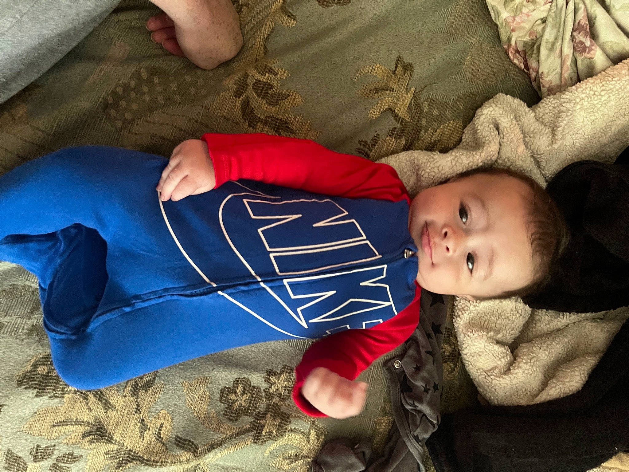 Jayvión joined the competition — help win amazing prizes! baby, baby_toddler_clothing, beach, carmine, child, comfort, elbow, electric_blue, fun, grass, happy, hat, headgear, human_body, lap, person, sitting, sleeve, thigh, toddler