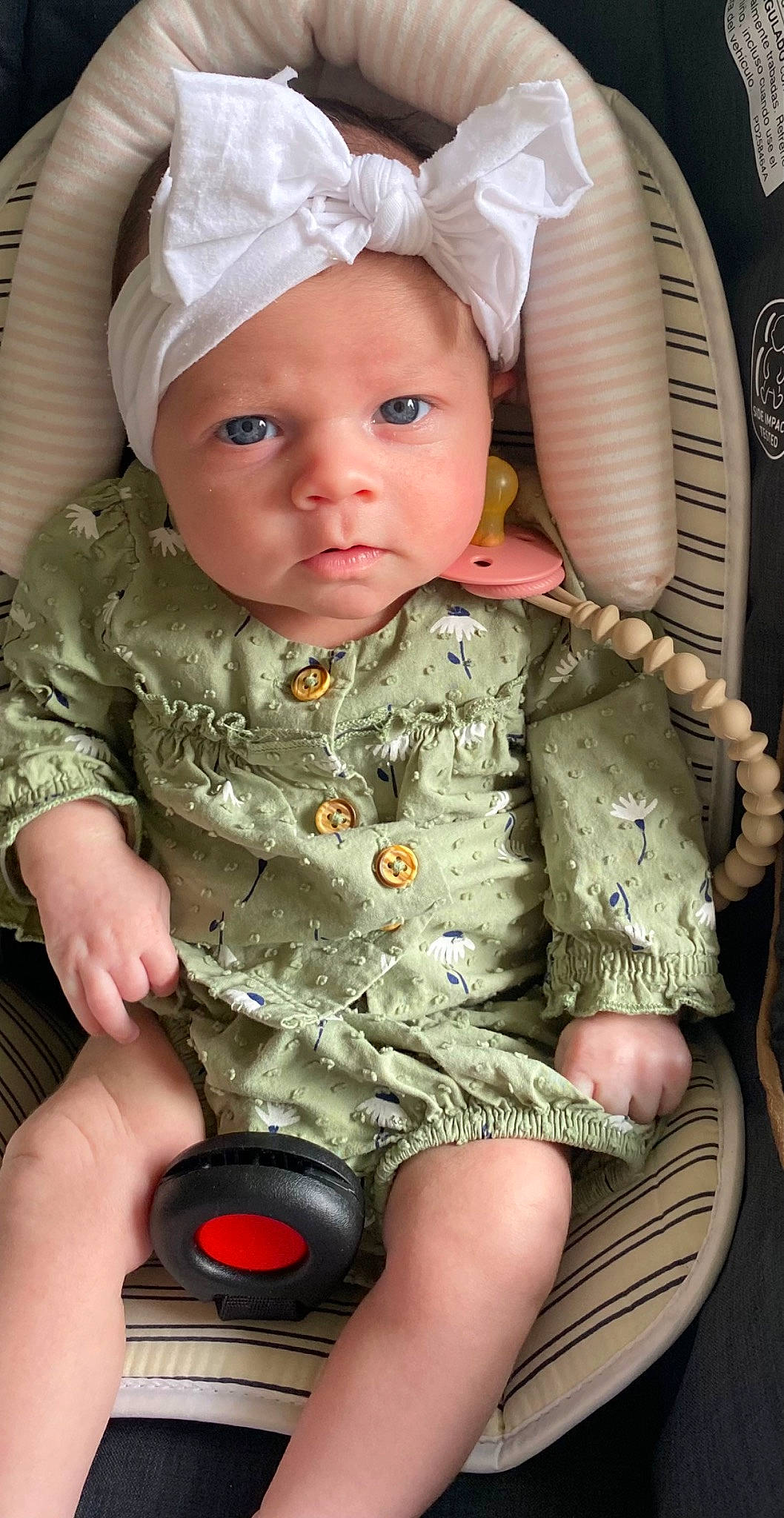 Brooklynn is registered to the contest to win money with this photo: baby, baby_toddler_clothing, cap, cheek, chin, cool, eye, face, facial_expression, finger, hand, headwear, iris, mouth, nose, organ, person, photograph, pink, skin