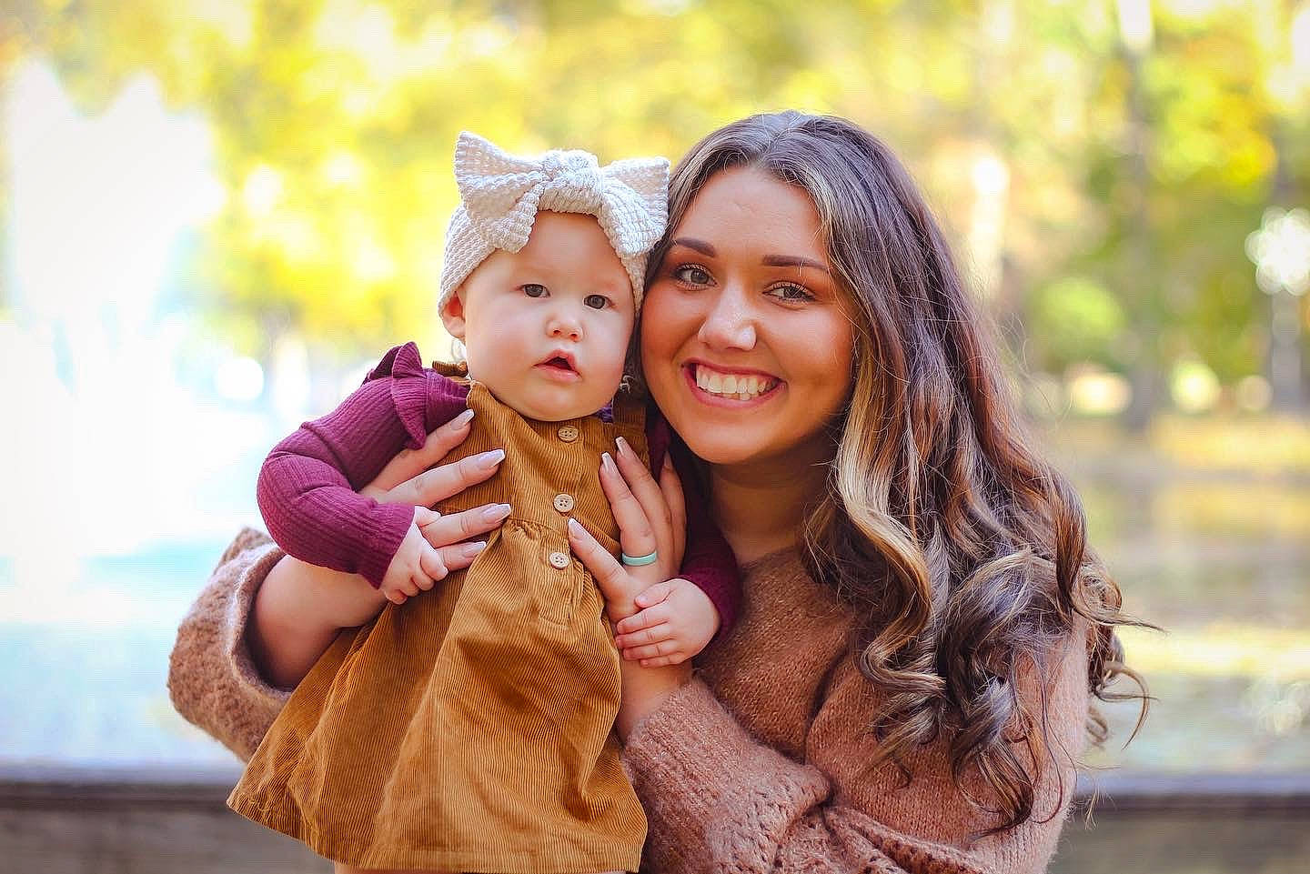 Colt is registered to the contest to win money with this photo: baby, dress, eye, flash_photography, gesture, grass, hand, happy, hat, head, headwear, joy, leaf, leisure, lip, people_in_nature, person, plant, skin, smile