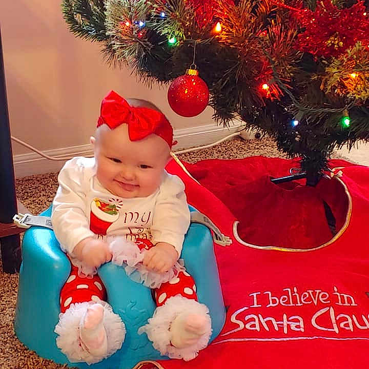 Gwendolyn joined the competition — help win amazing prizes! child, christmas, christmas_decoration, christmas_ornament, christmas_tree, event, fun, holiday, infant, joy, person, red, toddler