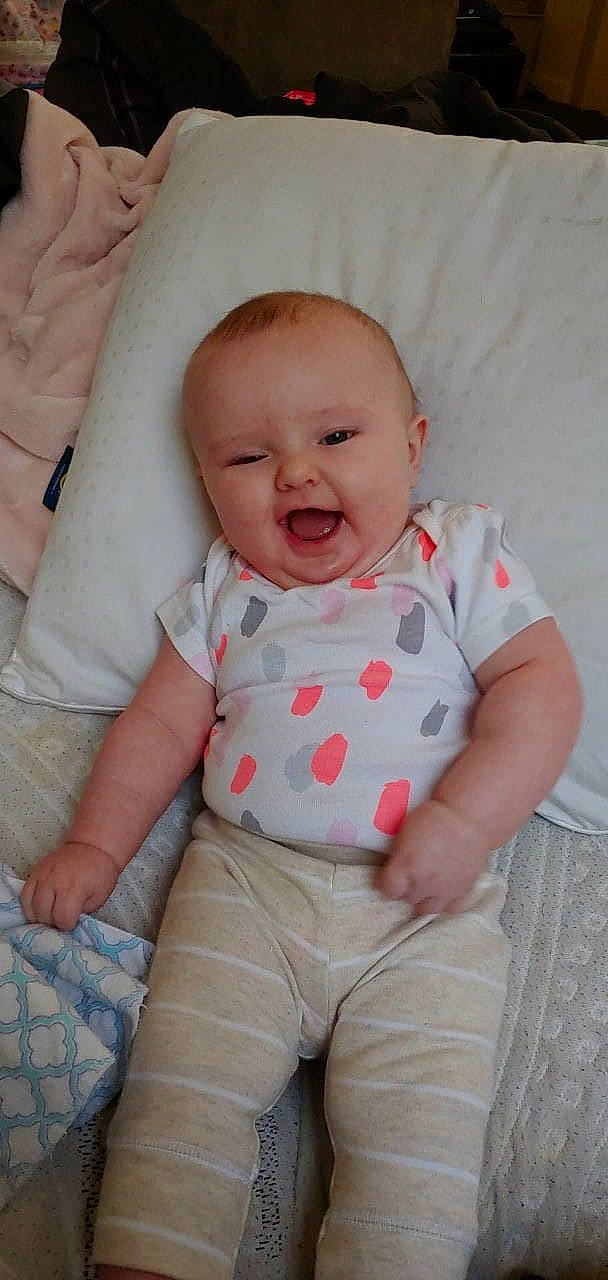 Gwendolyn joined the competition — help win amazing prizes! baby_products, cheek, child, day, girl, hand, head, infant, iris, mouth, nap, nose, person, product, sitting, skin, sleep, smile, textile, toddler