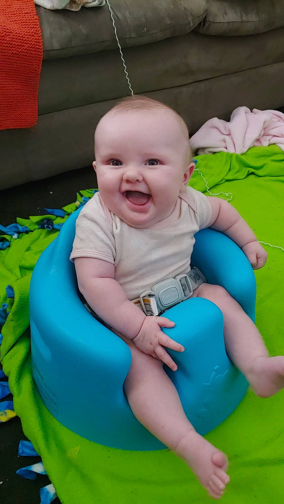 Gwendolyn is registered to the contest to win money with this photo: abdomen, baby_products, blue, boy, child, day, eye, fun, girl, green, happiness, infant, iris, mouth, person, play, product, sitting, skin, smile
