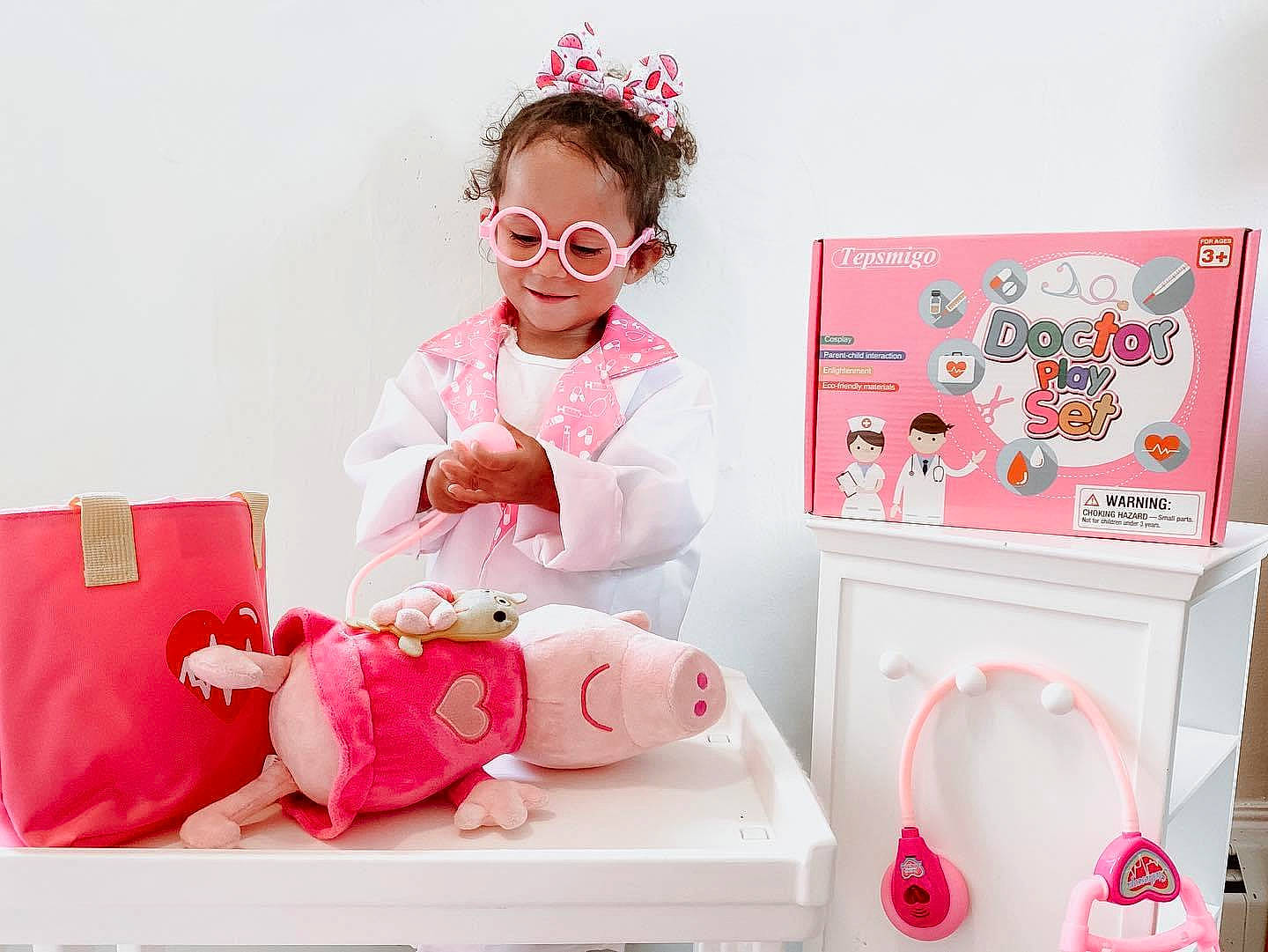 Lux is registered to the contest to win money with this photo: baby, child, ear, fashion_accessory, hair_accessory, person, pink, play, product, room, stuffed_toy, toddler, toy
