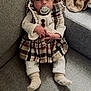 Myra a rejoint le concours — aidez-le/la à gagner de superbes lots ! baby, pacifier, bow, headband, plaid_dress, knit_pants, socks, carpet, stairs, jacket, indoor, child, cute, cozy, toddler, infant, portrait, relaxed, clothing, soft