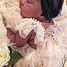 newborn, baby, sleeping, portrait, headband, bow, dress, ruffles, flowers, blanket, fluffy, indoor, close_up, peaceful, infant, fashion, floral, soft_lighting, photography, celebration