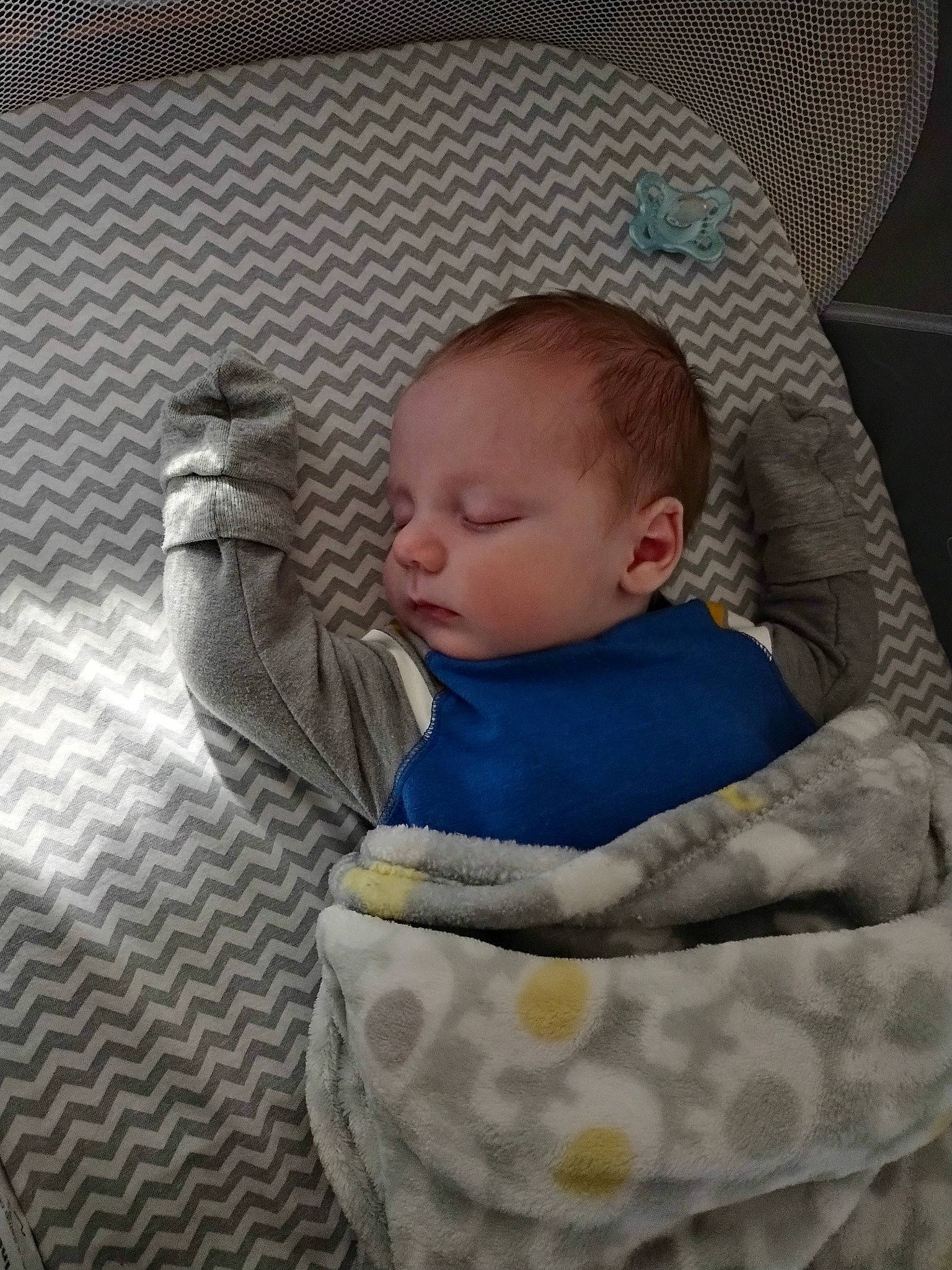 Elliot is registered to the contest to win money with this photo: baby, baby_products, baby_sleeping, baby_toddler_clothing, bedtime, cheek, child, comfort, flooring, head, linens, nap, pattern, person, room, sitting, skin, sleep, sleeve, toddler