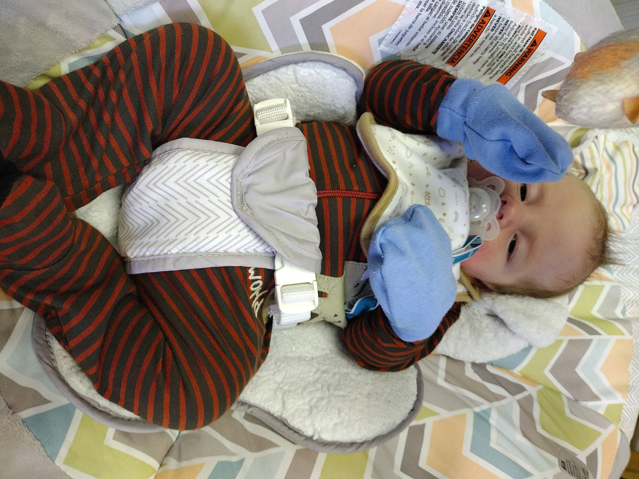 Elliot joined the competition — help win amazing prizes! baby, baby_toddler_clothing, comfort, elbow, flooring, hat, headgear, human_leg, knee, lap, pattern, person, room, sitting, sock, sunglasses, thigh, toddler, white, wood