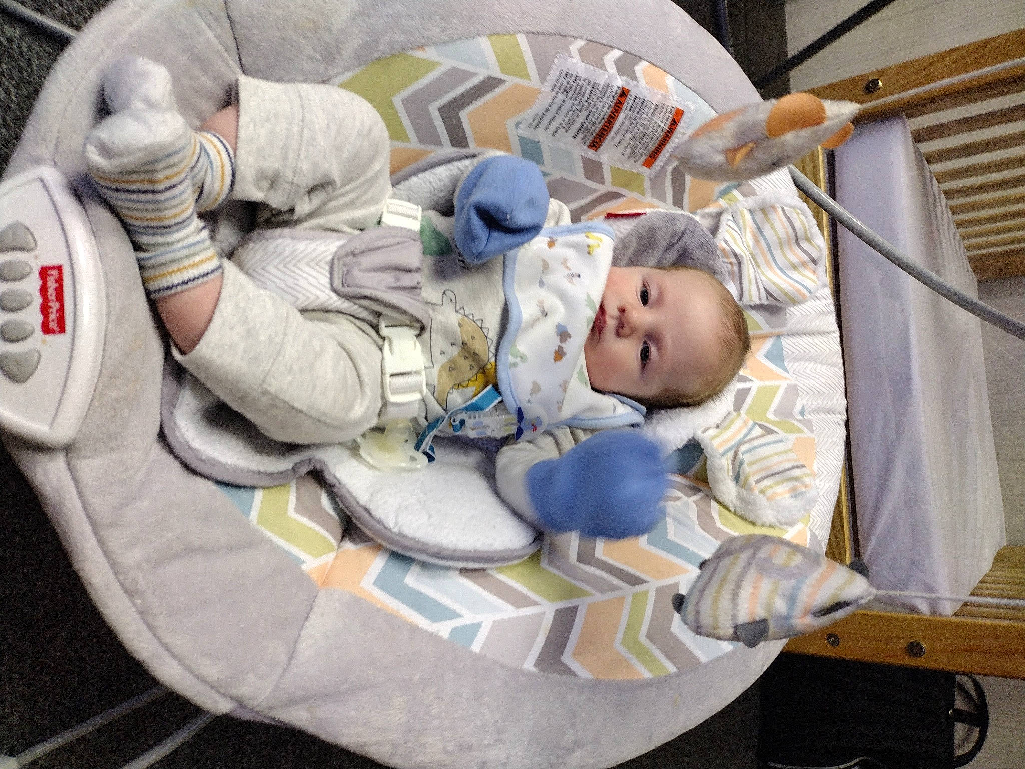 Elliot joined the competition — help win amazing prizes! astronaut, auto_part, automotive_wheel_system, baby, baby_carriage, baby_products, baby_safety, baby_toddler_clothing, child, comfort, fictional_character, hat, health_care, person, service, sitting, toddler