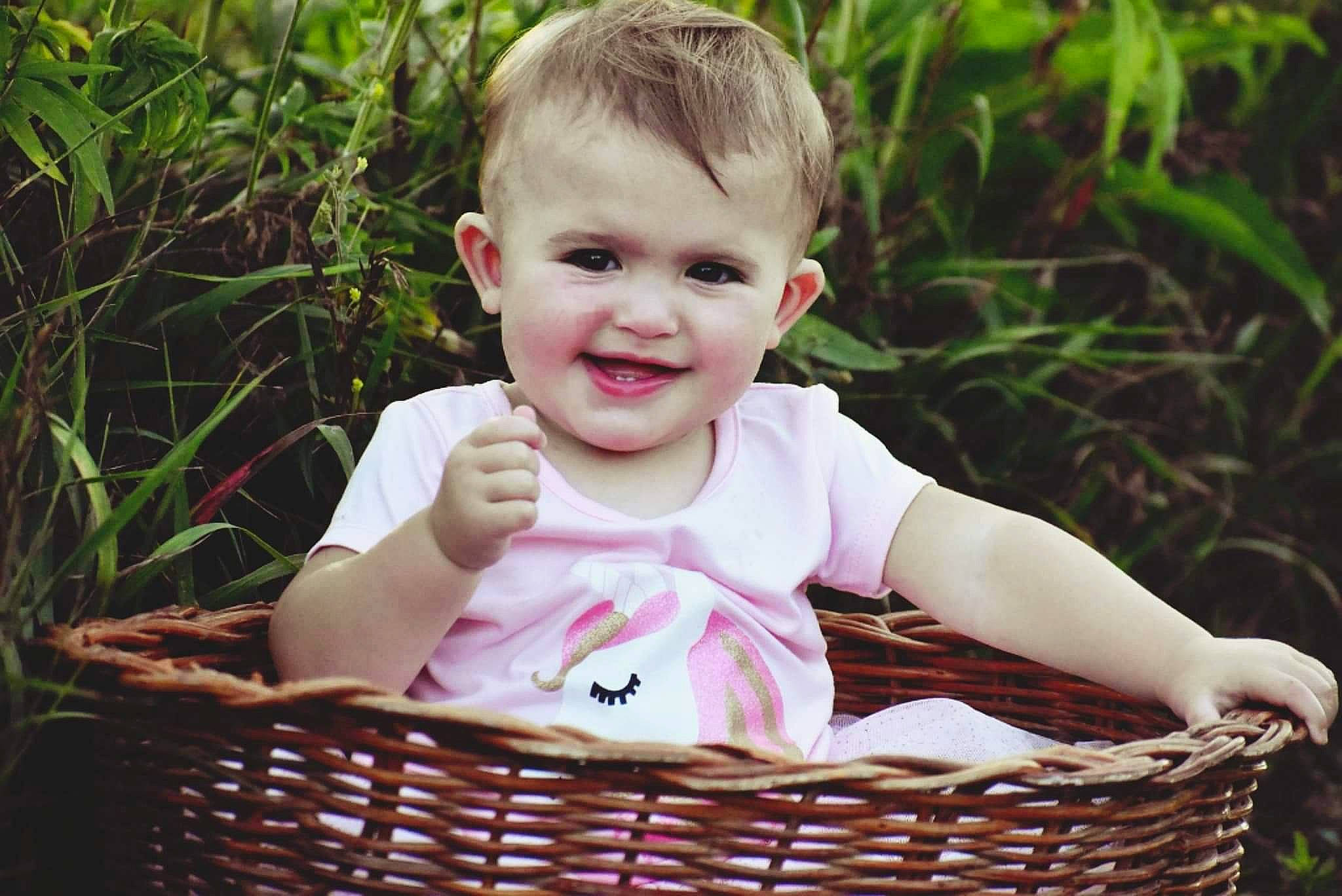 Iris joined the competition — help win amazing prizes! baby, baby_products, baby_toddler_clothing, basket, cheek, child, grass, grass_family, happy, joy, laugh, leisure, people_in_nature, person, picnic_basket, plant, portrait_photography, sitting, smile, storage_basket
