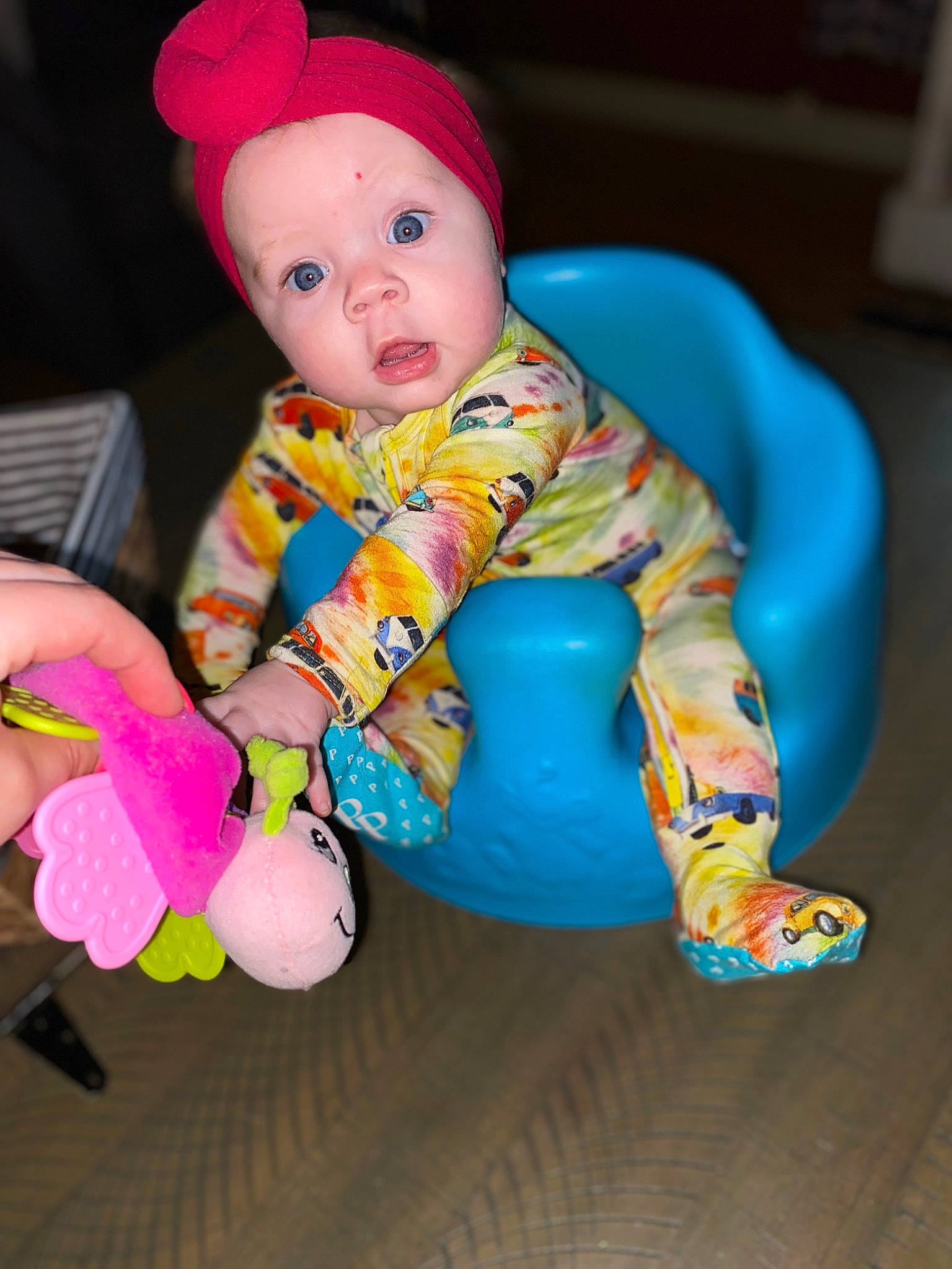 Jazlyn is registered to the contest to win money with this photo: baby, baby_products, baby_toddler_clothing, baby_toys, cap, child, collectable, doll, figurine, fun, magenta, person, pink, plastic, plush, room, sitting, sleeve, stuffed_toy, surprise
