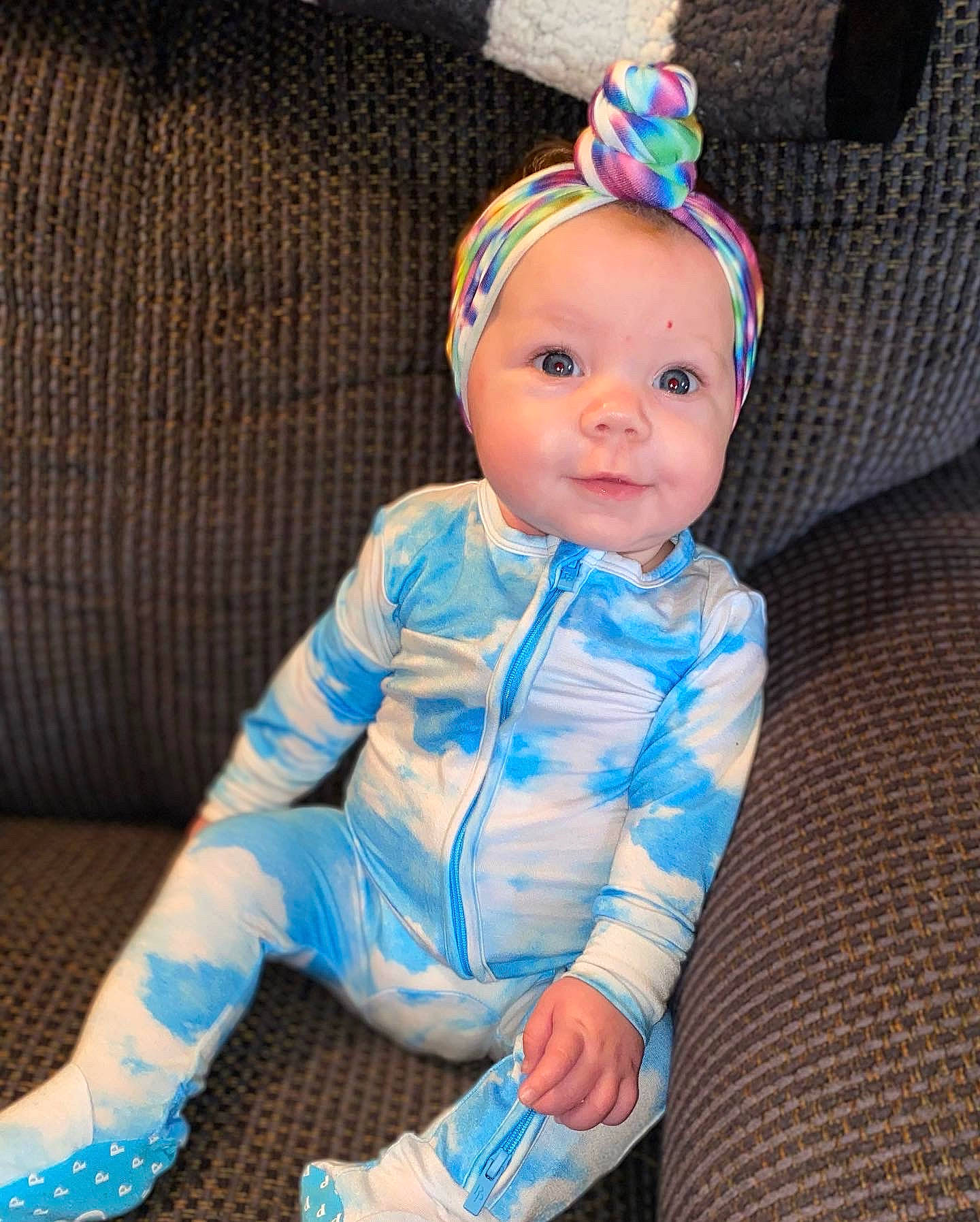 Jazlyn is registered to the contest to win money with this photo: baby, baby_toddler_clothing, beanie, cheek, child, costume_hat, electric_blue, eye, fashion_accessory, happy, head, headband, headwear, knit_cap, outerwear, pattern, person, sitting, skin, sleeve