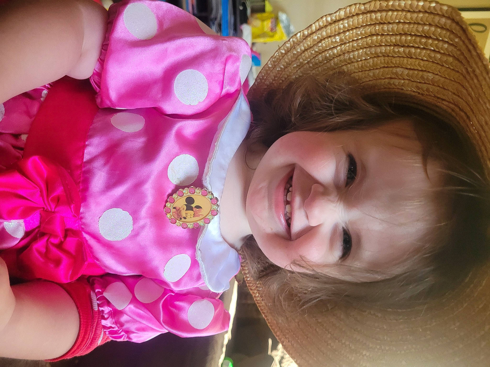 Maci is registered to the contest to win money with this photo: brown_hair, child, chin, eye, eyelash, fashion_accessory, fun, hair, happy, hat, head, headgear, joy, lip, magenta, nose, person, petal, pink, skin