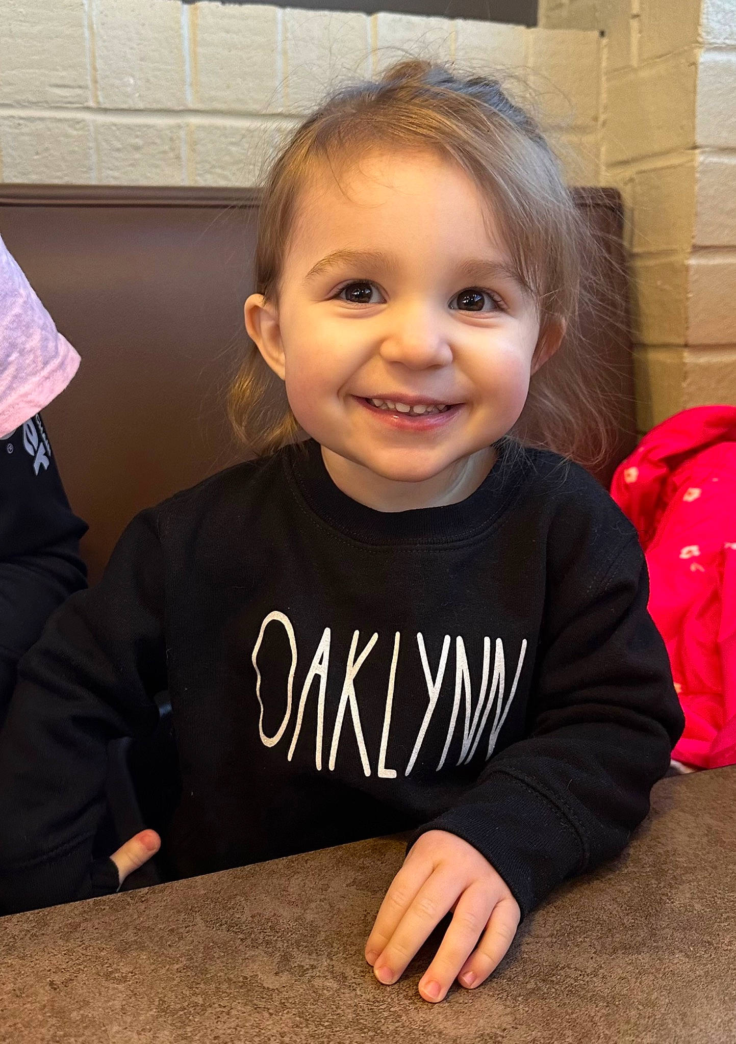 Oaklynn is registered to the contest to win money with this photo: baby_toddler_clothing, cheek, child, chin, eye, floor, flooring, fun, hair, happy, head, iris, joy, luggage_and_bags, nose, person, skin, sleeve, smile, standing