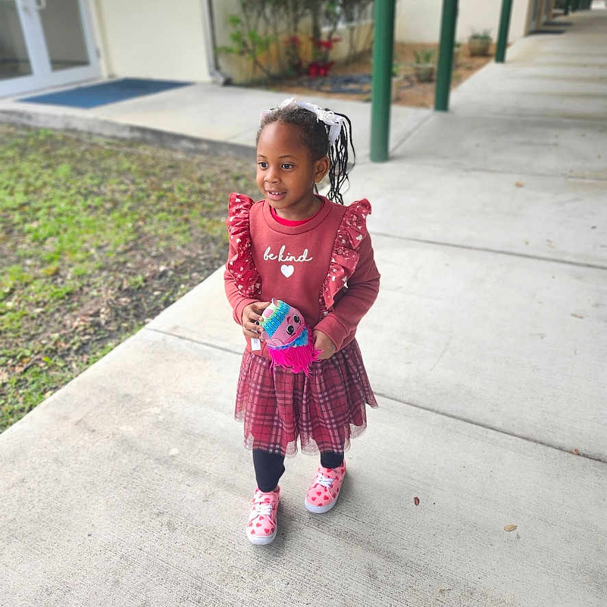 Ty'Neoko joined the competition — help win amazing prizes! child, city, clothing, coat, face, female, girl, head, jacket, longsleeve, path, person, photography, portrait, road, sidewalk, sleeve, street, urban, walking