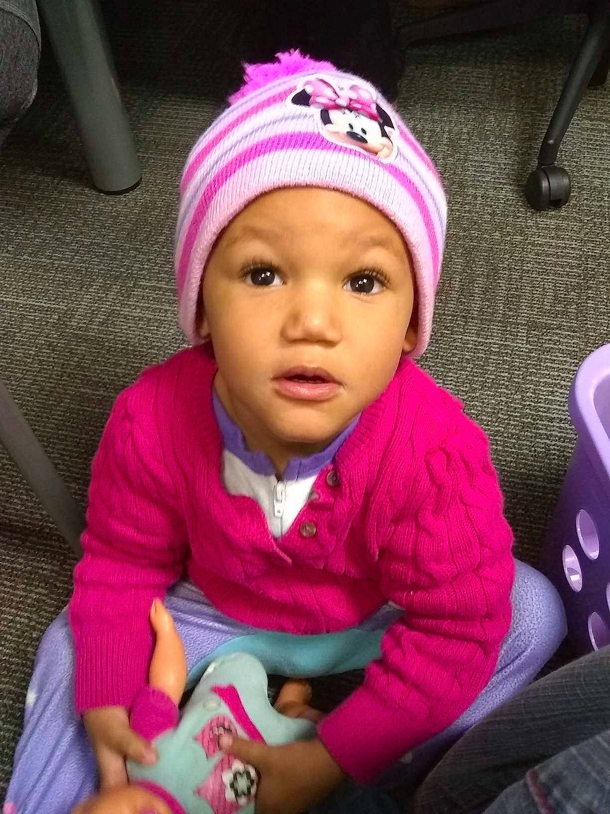 Keria is registered to the contest to win money with this photo: baby, baby_products, cheek, child, cool, daughter, face, hair_accessory, head, headgear, headwear, lip, magenta, person, pink, product, skin, smile, toddler