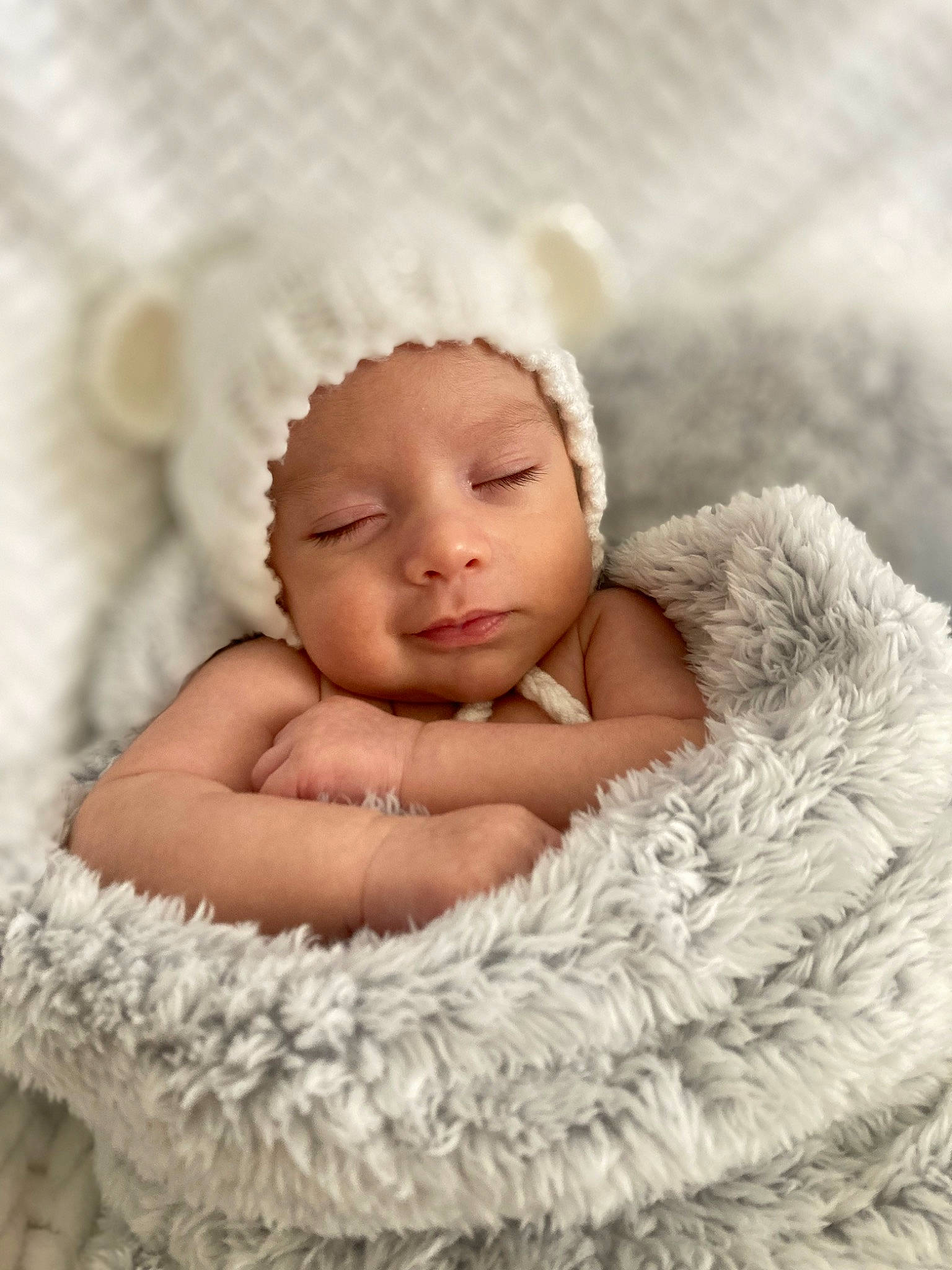 Allan is registered to the contest to win money with this photo: baby, baby_toddler_clothing, cheek, child, comfort, eye, eyebrow, face, flash_photography, fur, happy, head, headgear, headwear, iris, linens, lip, person, skin, toddler