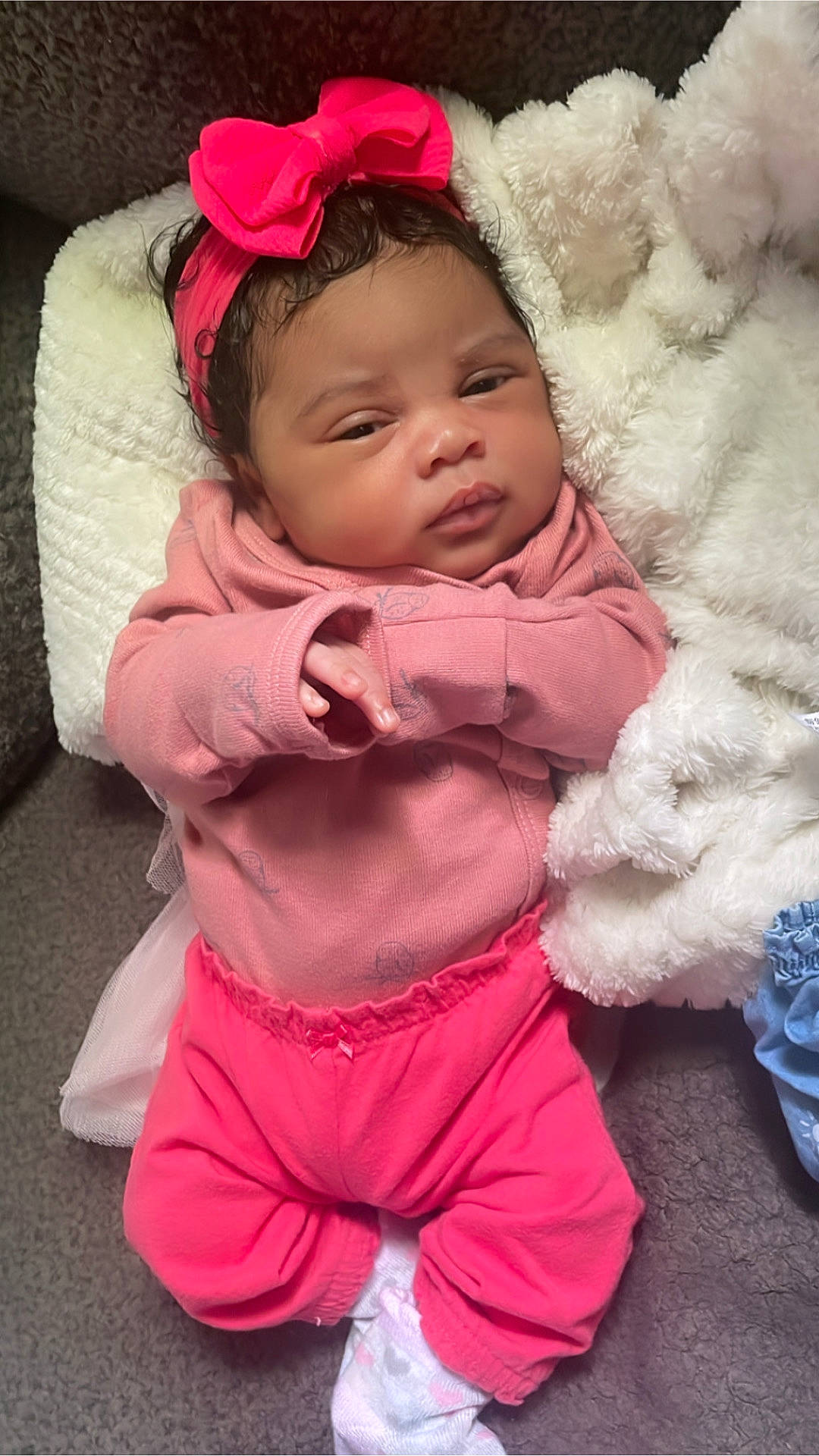 Jaylaní joined the competition — help win amazing prizes! baby, baby_toddler_clothing, cap, cheek, child, comfort, eye, face, fashion_accessory, fur, happy, head, lip, magenta, nose, person, pink, sitting, skin, sleeve