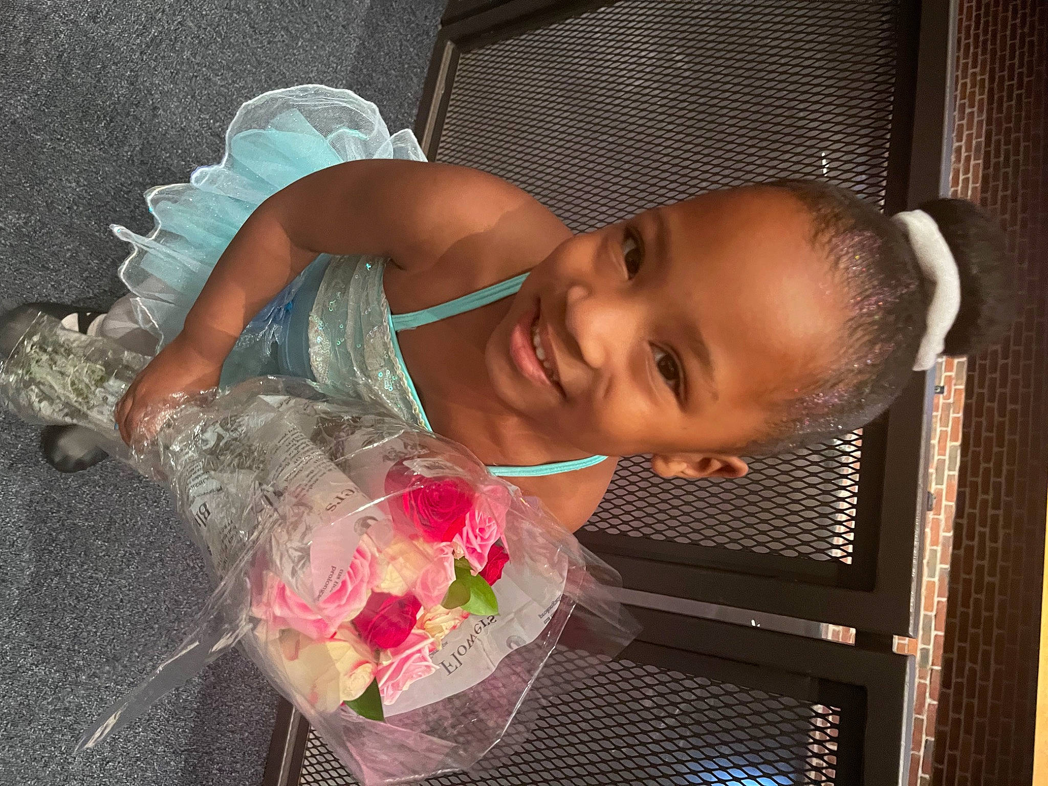 Kadynce is registered to the contest to win money with this photo: baby, baby_toddler_clothing, bathing, chest, child, cut_flowers, flash_photography, flesh, flower, fun, happy, jewellery, joy, lip, person, petal, plastic_bottle, rose, rose_family, skin