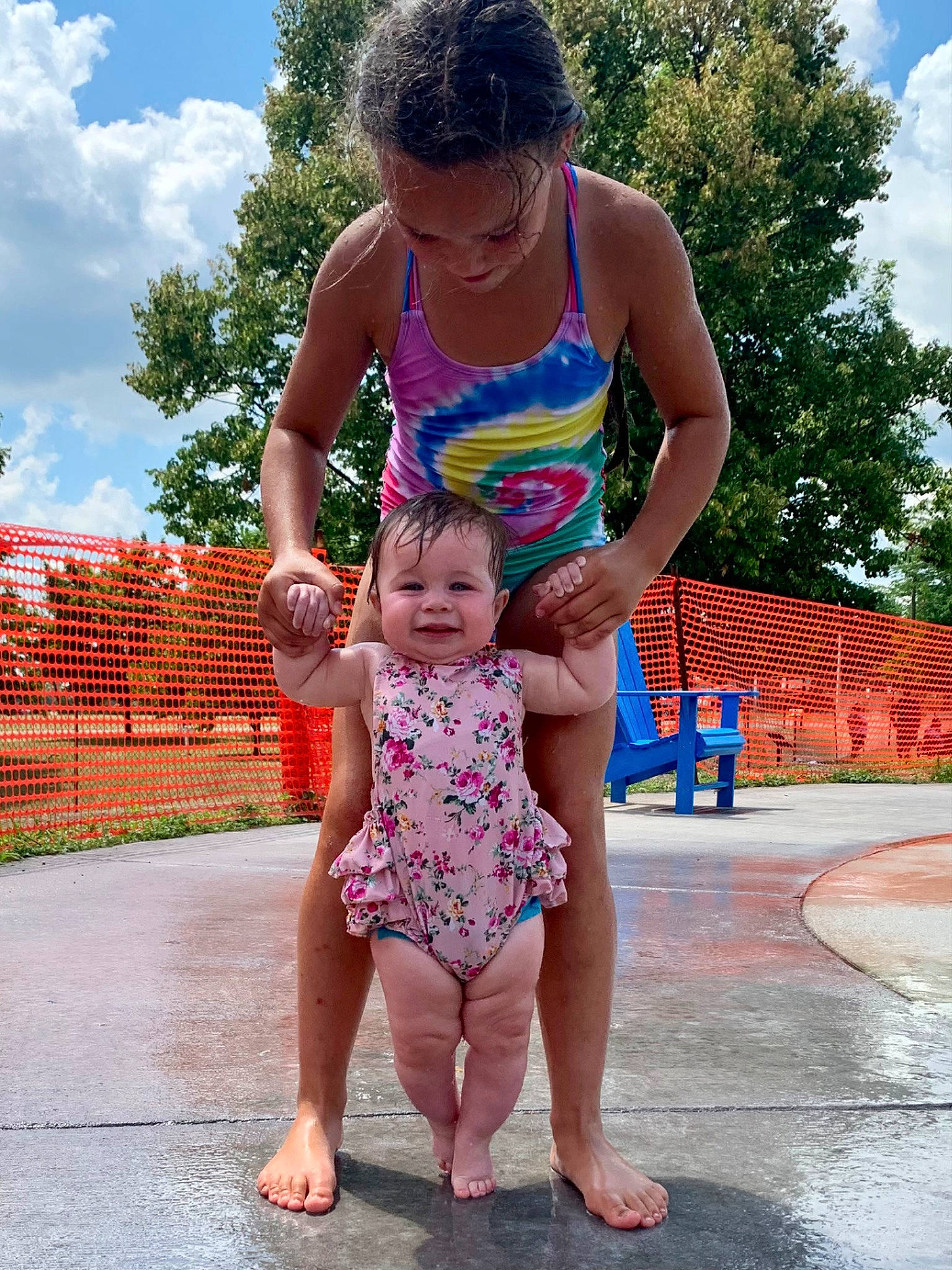 Evelyn joined the competition — help win amazing prizes! baby, baby_toddler_clothing, barefoot, cloud, face, foot, fun, glasses, happy, joy, leg, leisure, person, pink, recreation, sky, summer, swimwear, thigh, toddler