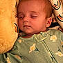 Charlotte joined the competition — help win amazing prizes! baby, sleeping, infant, onesie, floral_pattern, cushion, pillow, soft_texture, cozy, peaceful, child, face, head, apparel, rest, indoors, comfort, toddler, closeup, portrait