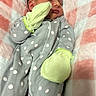 baby, newborn, sleeping, blanket, polka_dot, onesie, mittens, infant, cozy, soft, pink, gray, white, cute, child, peaceful, portrait, resting, indoors, person