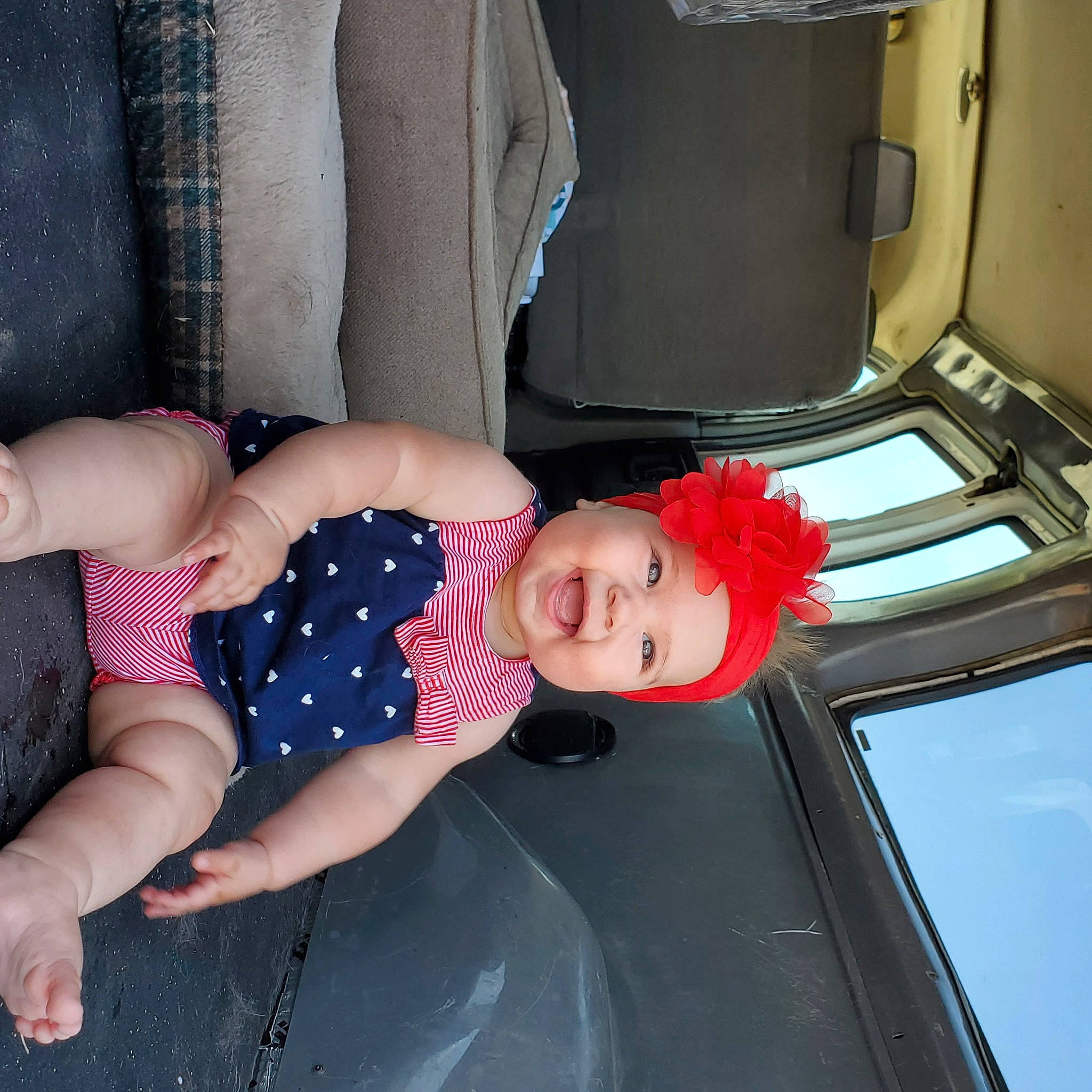 Addisyn is registered to the contest to win money with this photo: arm, baby, baby_toddler_clothing, child, foot, headwear, human_body, person, polka_dot, toddler, toe