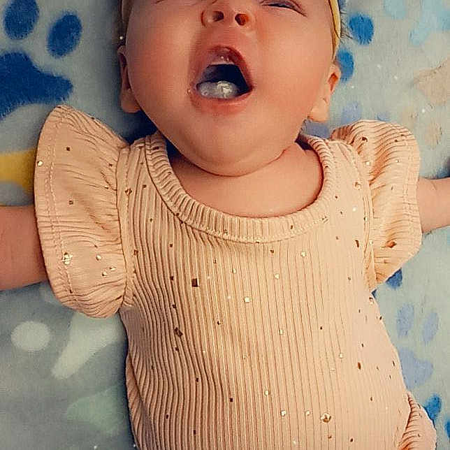Kaleya joined the competition — help win amazing prizes! adorable, baby, blanket, child, clothing, cute, expression, face, happy, headband, infant, laughing, lying_down, mouth_open, paw_print, peach, skin, small_person, smiling, sparkle